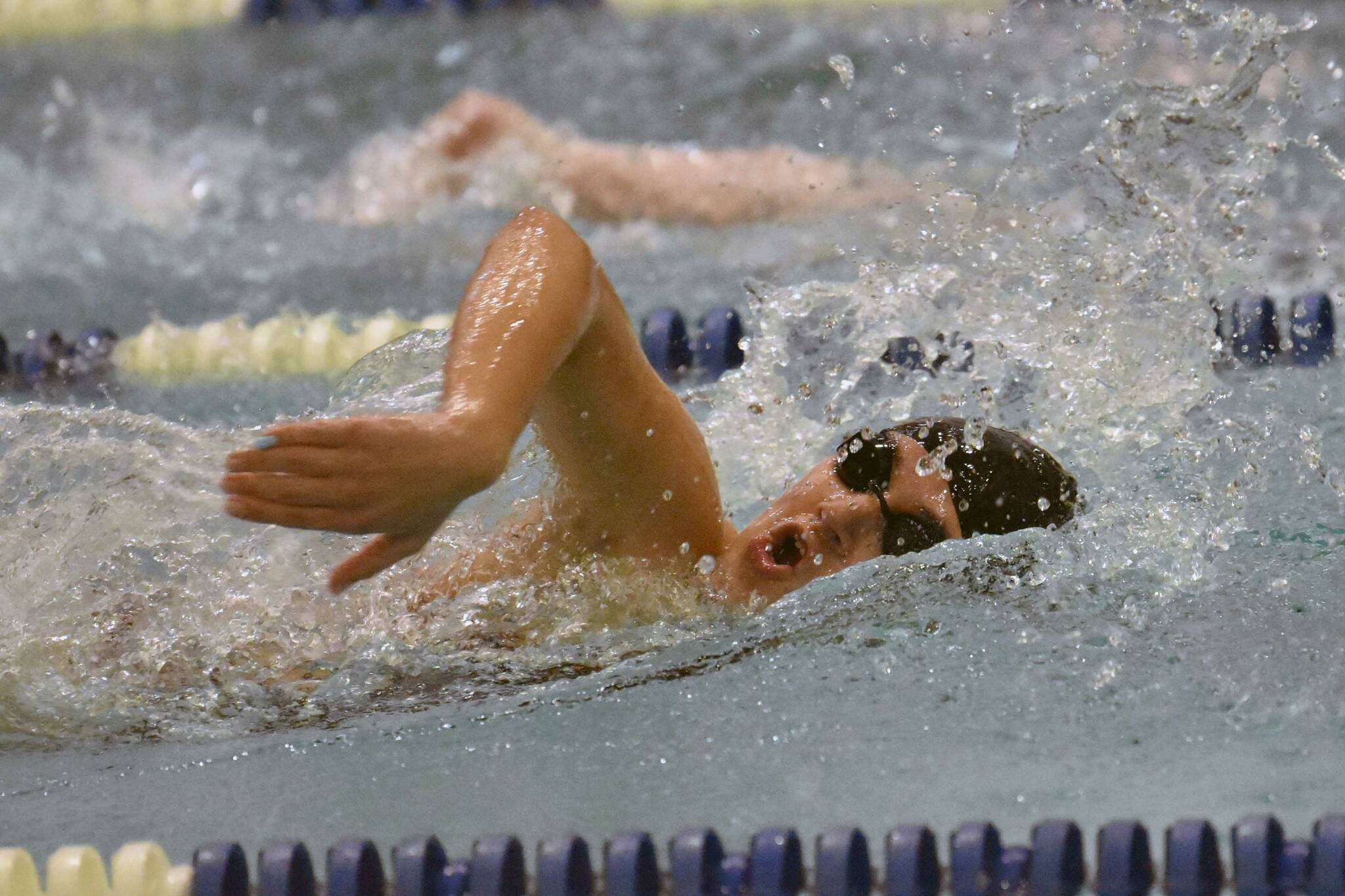 Kenai Central's Abigail Price finishes second in the 500-yard freestyle Saturday, Oct. 28, 2023, at the Northern Lights Conference swim meet at Soldotna High School in Soldotna, Alaska. (Photo by Jeff Helminiak/Peninsula Clarion)