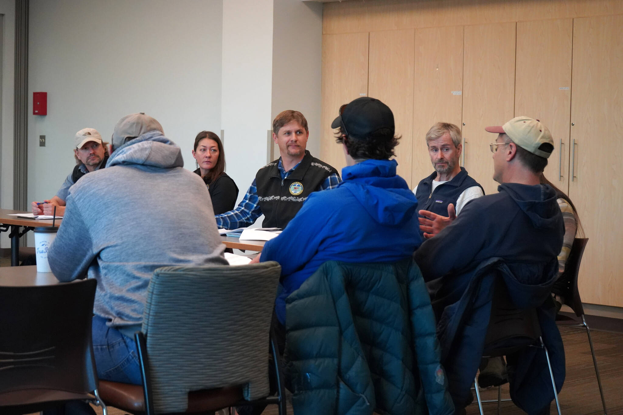 Members of the State Department of Fish and Game’s Division of Sport Fish listen to questions at a “Town Hall Style Meeting” held at Soldotna Public Library in Soldotna, Alaska, on Thursday, Oct. 26, 2023. (Jake Dye/Peninsula Clarion)