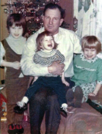 Photo from Ball Family memorial slideshow, 2022
This photo from the early 1960s shows Jackson Ball enjoying the Christmas holidays with his eldest three daughters. His fourth and youngest daughter was born less than a year and a half before Ball’s death in 1968.