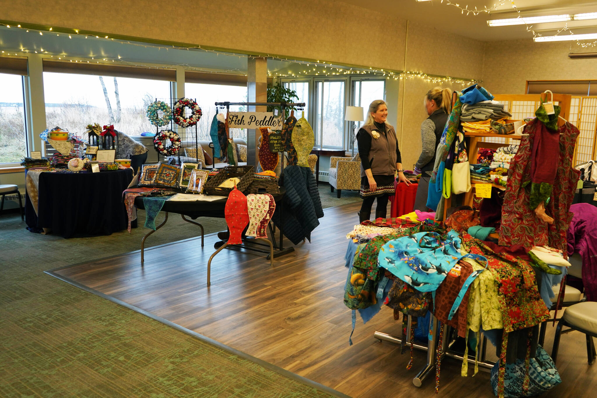 Vendors sell wares to attendees of the Vintage Collectibles and Craft Show at the Kenai Senior Center in Kenai, Alaska, on Saturday, Nov. 4, 2023. (Jake Dye/Peninsula Clarion)