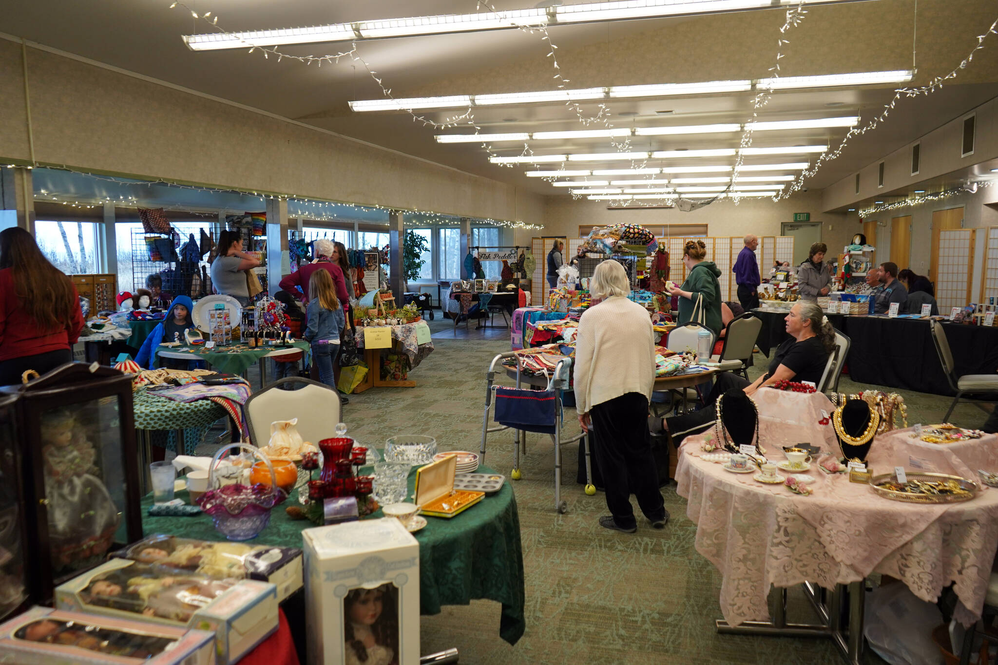 Vendors sell wares to attendees of the Vintage Collectibles and Craft Show at the Kenai Senior Center in Kenai, Alaska, on Saturday, Nov. 4, 2023. (Jake Dye/Peninsula Clarion)