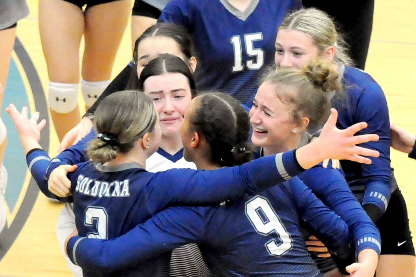 Soldotna players celebrate after beating Kodiak in five sets in a loser-out game of the Northern Lights Conference tournament Friday, Nov. 3, 2023, at Kodiak High School in Kodiak, Alaska. (DEREK CLARKSTON/Kodiak Daily Mirror)