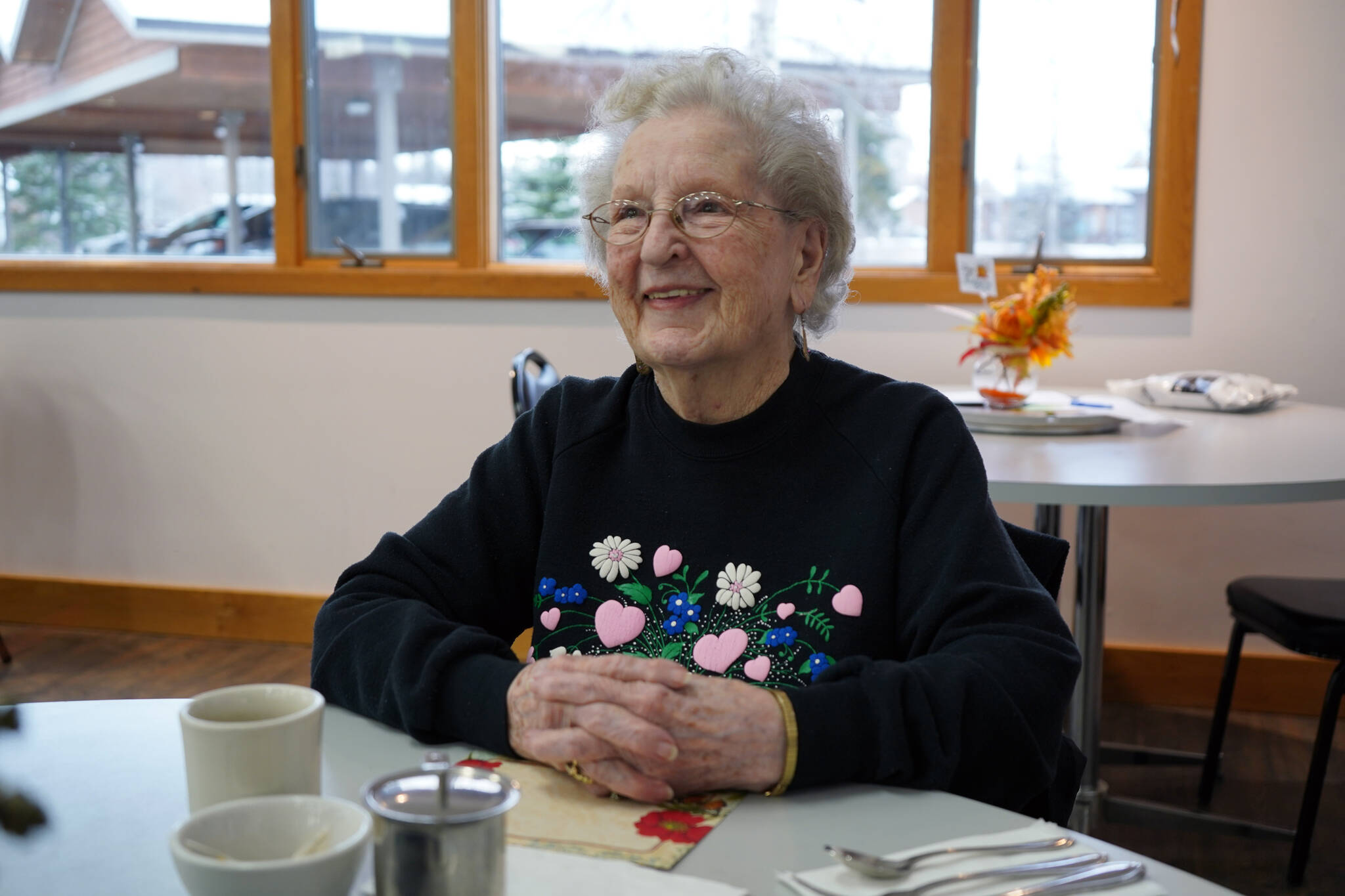 Margarette Marsh sits to eat lunch and visit with friends at the Soldotna Senior Center in Soldotna, Alaska, on Monday, Nov. 6, 2023. (Jake Dye/Peninsula Clarion)