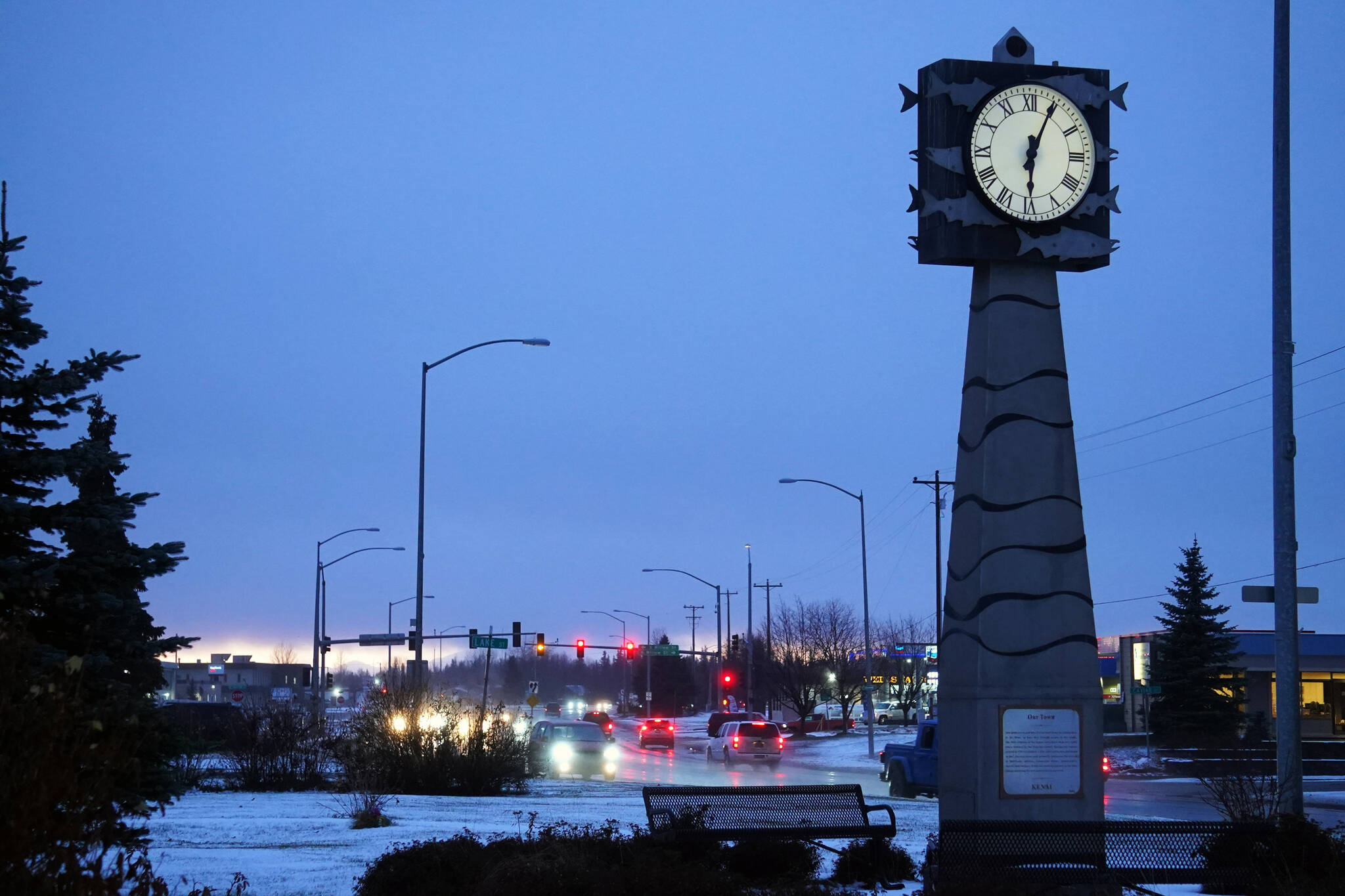 Cars travel over the Kenai Spur Highway in Kenai, Alaska, after snow and rain fell Wednesday, Nov. 8, 2023. (Jake Dye/Peninsula Clarion)