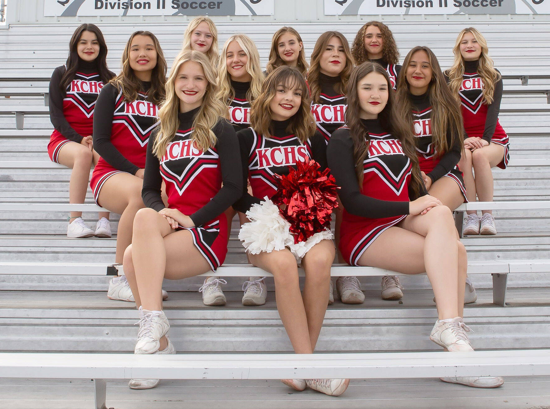 The Kenai Central cheerleading team. Top row, left to right: Alicia Perez, Truly Hondel, Kayani Whicker, Kimber Moore, Cara Graves. Middle row, left to right: Alex Nelson, Scarlett Gibson, Caitlyn Martin, Ellee Pancoast. Bottom row, left to right: Makenzie Harden, Ella Romero, Sylvia McGraw.