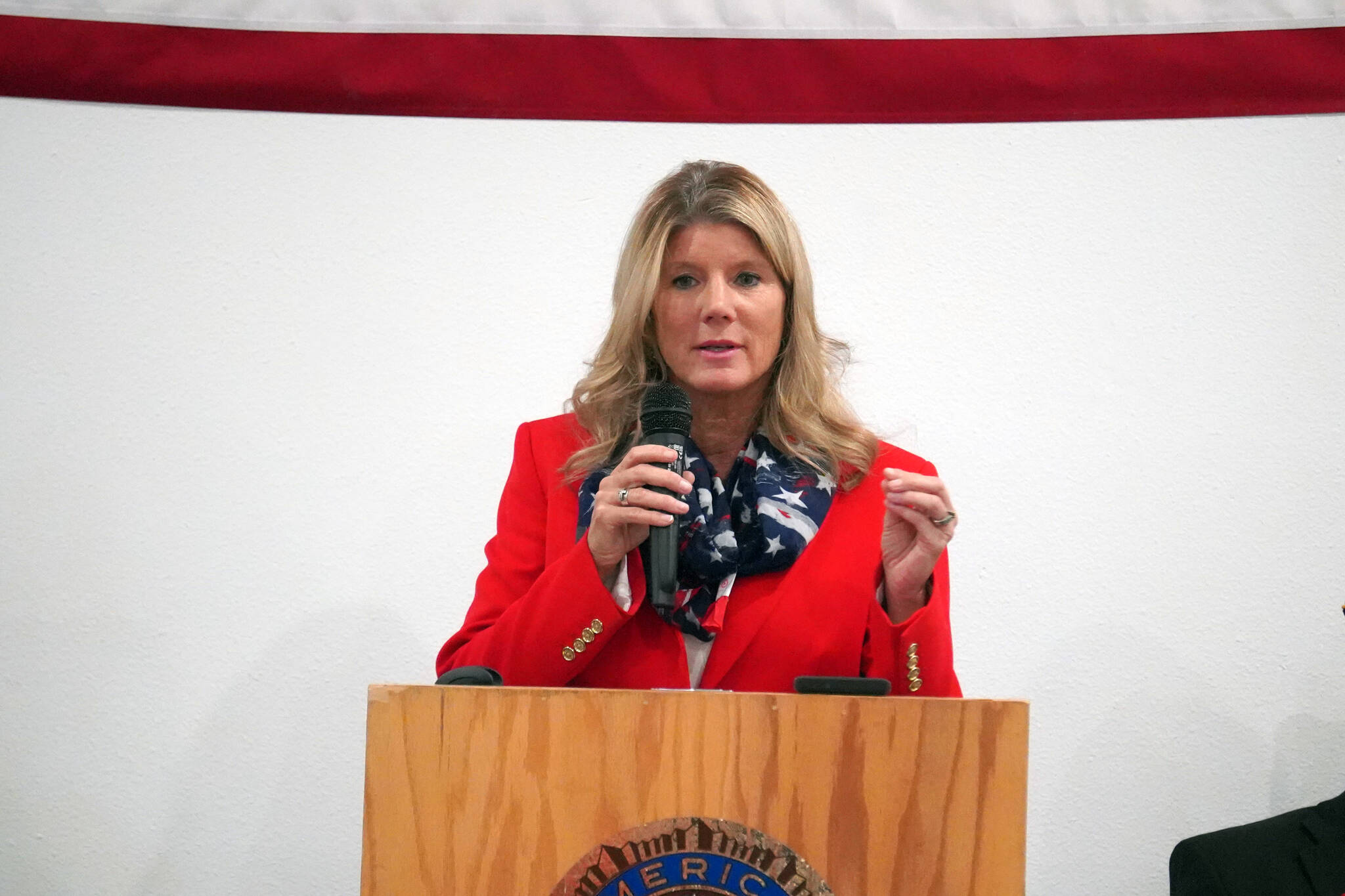 Elaina Spraker, representative for Sen. Dan Sullivan, speaks during a Veterans Day celebration at the American Legion Post 20 in Kenai, Alaska, on Saturday, Nov. 11, 2023. (Jake Dye/Peninsula Clarion)