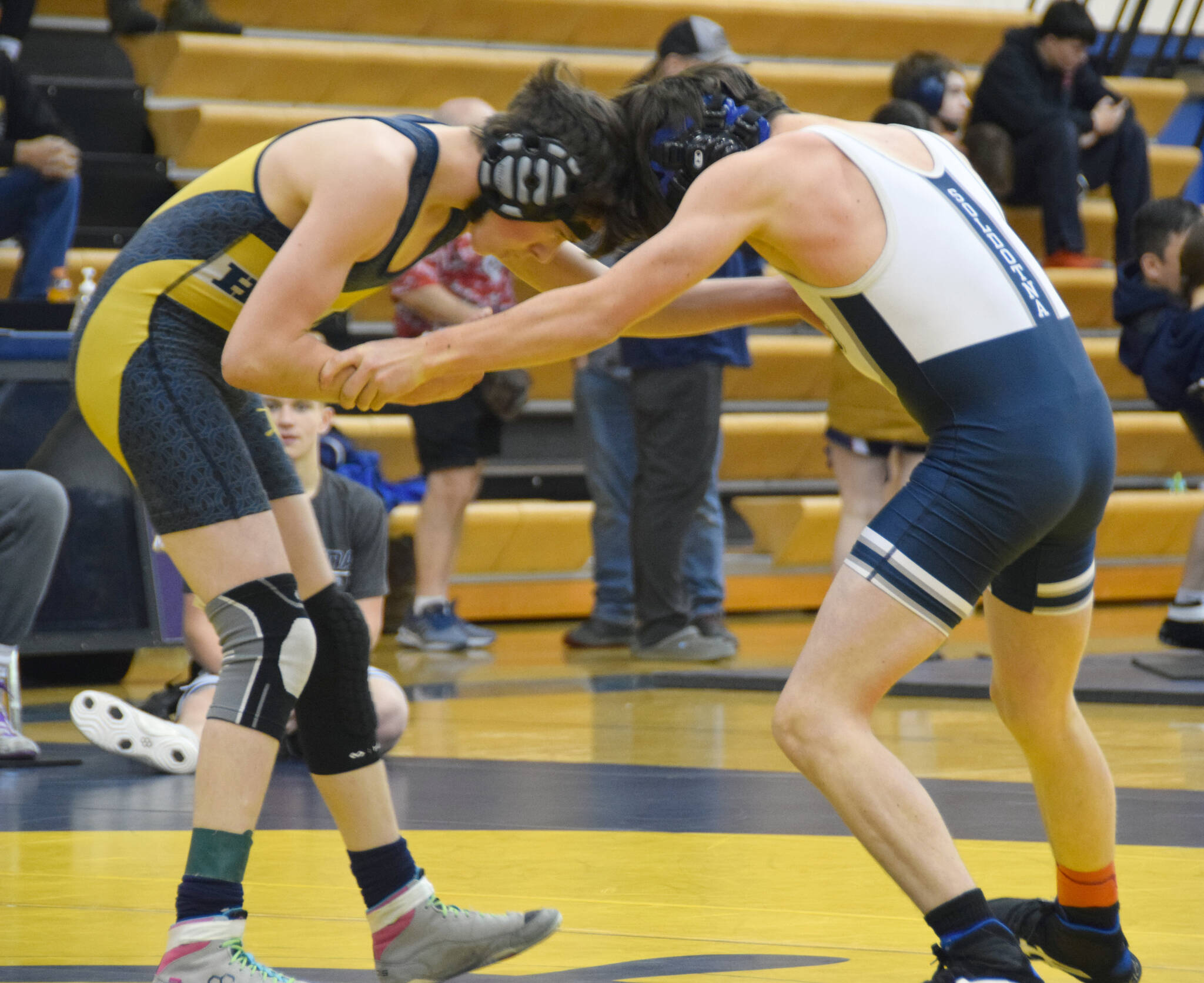 Homer’s Bryce Hagge competes against Soldotna’s Grady Abrams at 112 pounds at the Homer Round Robin Rumble on Saturday, Nov. 11, 2023, at Homer High School in Homer, Alaska. (Photo by Finn Heimbold/Homer News)