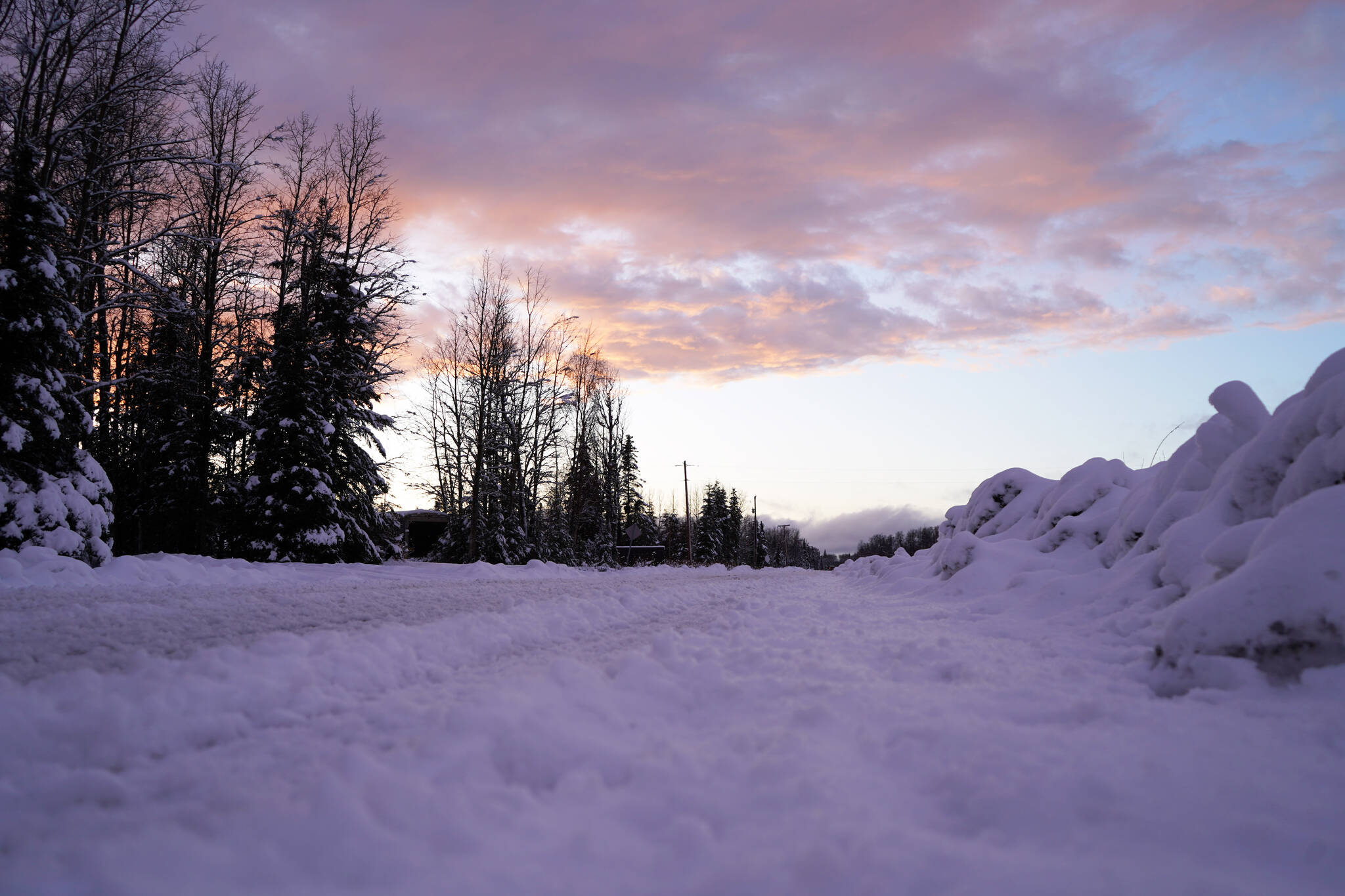 Snow and slush cover Murwood Avenue in Soldotna, Alaska, on Wednesday, Nov. 15, 2023. (Jake Dye/Peninsula Clarion)