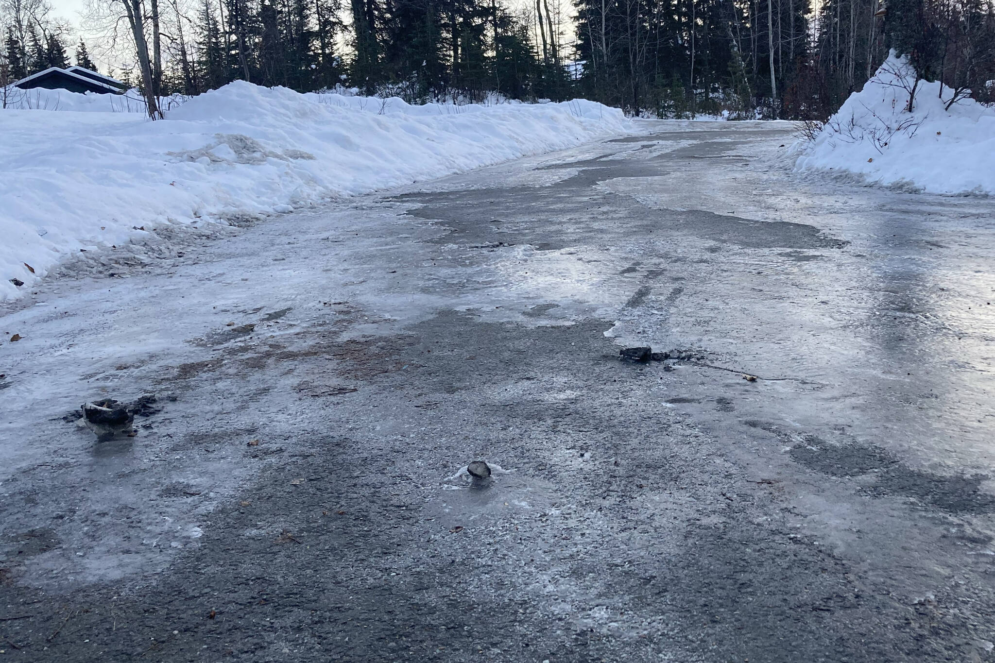 An icy driveway in Kenai, Alaska, on Nov. 16, 2023. (Photo by Jeff Helminiak/Peninsula Clarion)