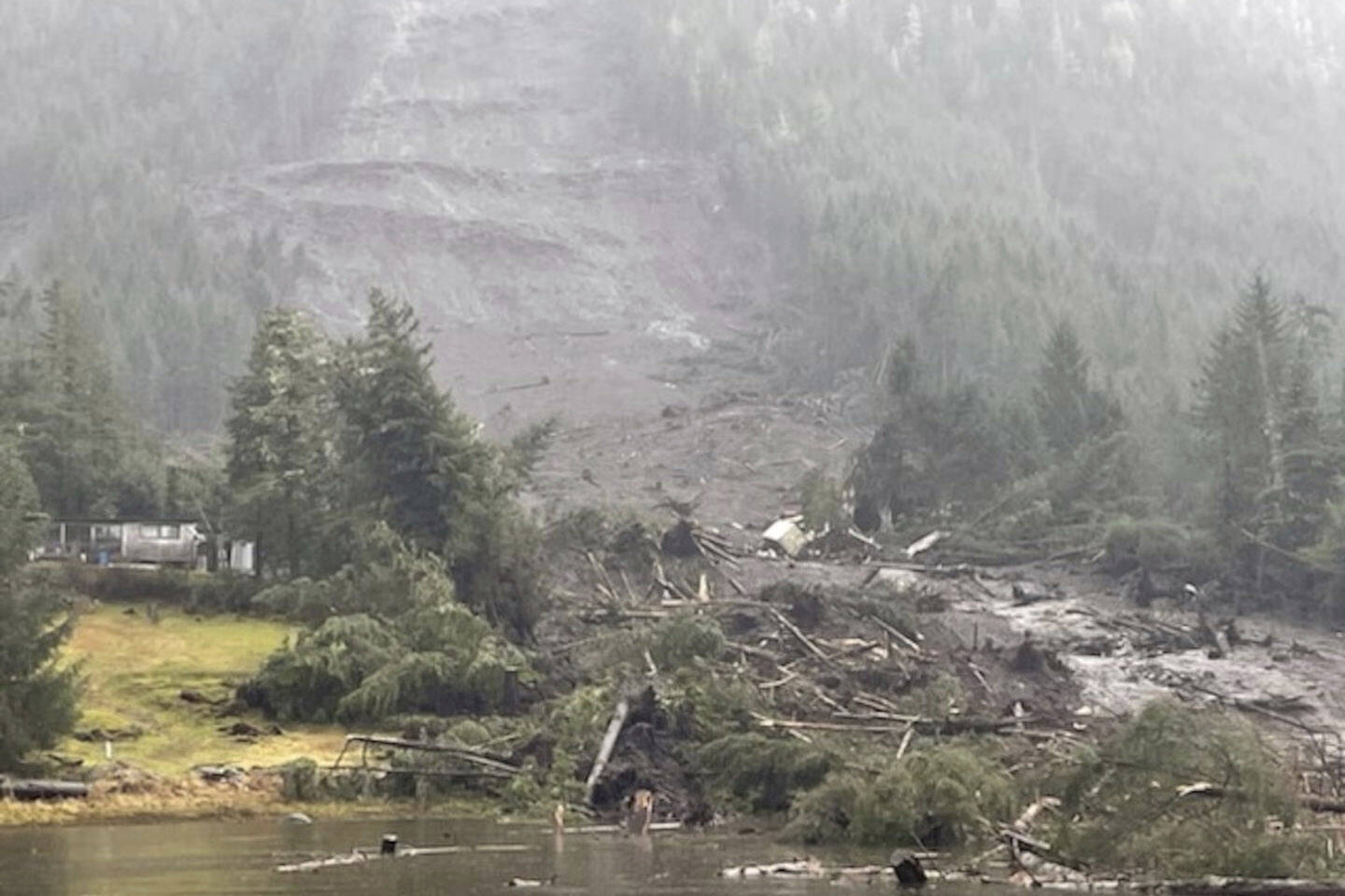 In this image provided by the U.S. Coast Guard is the aftermath of a landslide in Wrangell, Alaska on Tuesday, Nov. 21, 2023. (U.S. Coast Guard photo via AP)