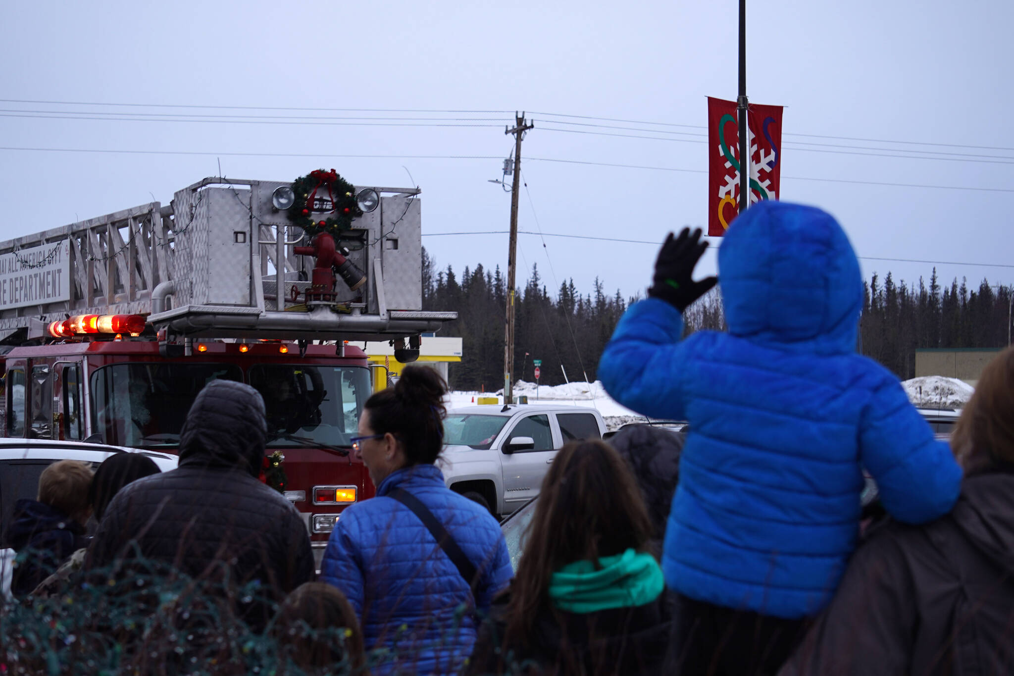 The Kenai Fire Department delivers Santa Claus to Christmas Comes to Kenai festivities at the Kenai Chamber of Commerce and Visitor Center in Kenai, Alaska, on Friday, Nov. 24, 2023. (Jake Dye/Peninsula Clarion)