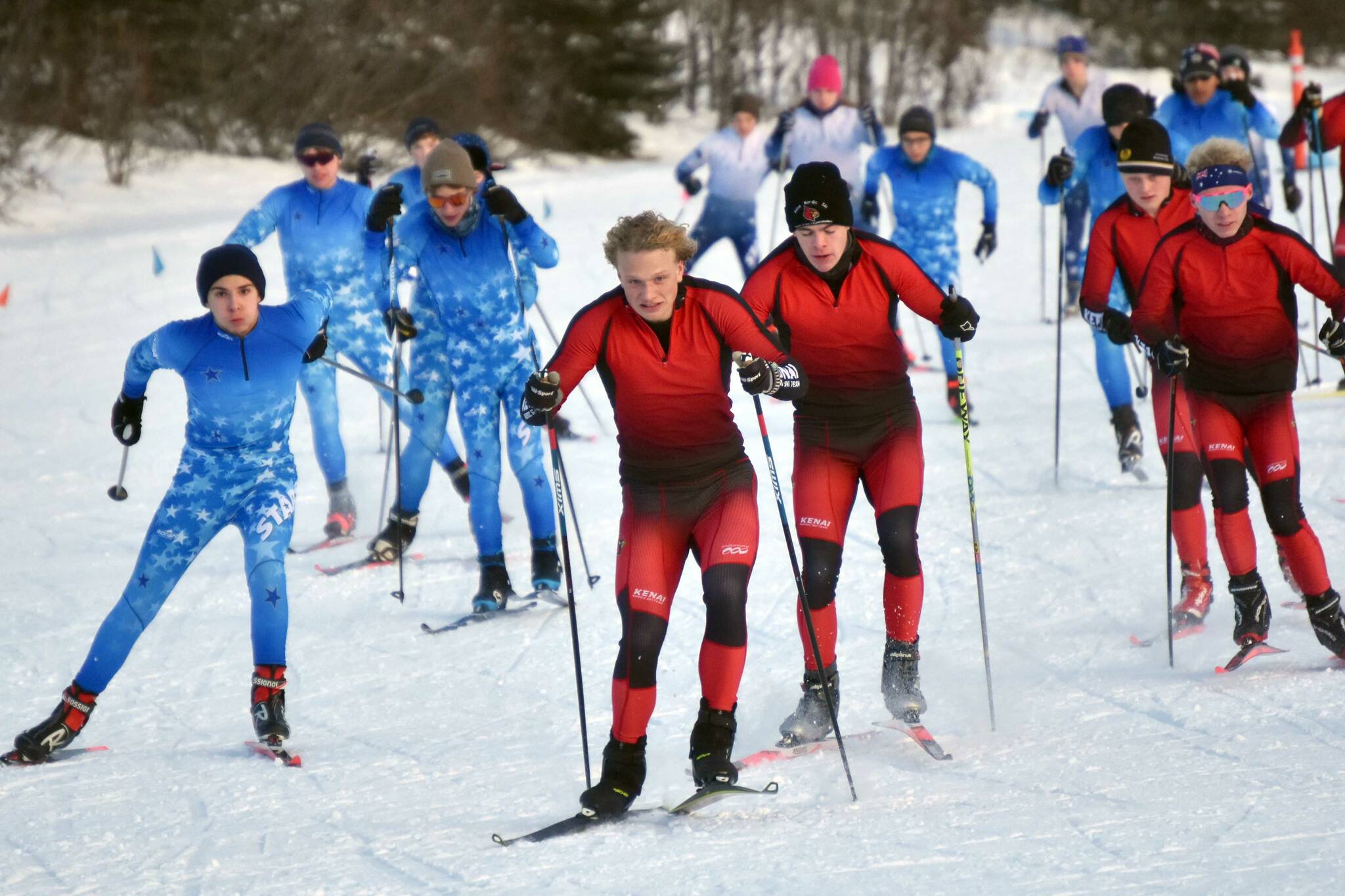 Kenai Centra's Jack Laker leads skiers at the start of the Turkey Skate on Tuesday, Nov. 21, 2023, at Tsalteshi Trails just outside of Soldotna, Alaska. (Photo by Jeff Helminiak/Peninsula Clarion)