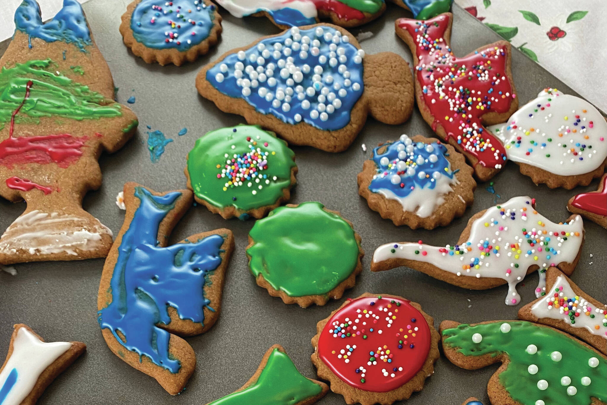 These festive gingerbread cookies are topped with royal icing and sprinkles. (Photo by Tressa Dale/Peninsula Clarion)