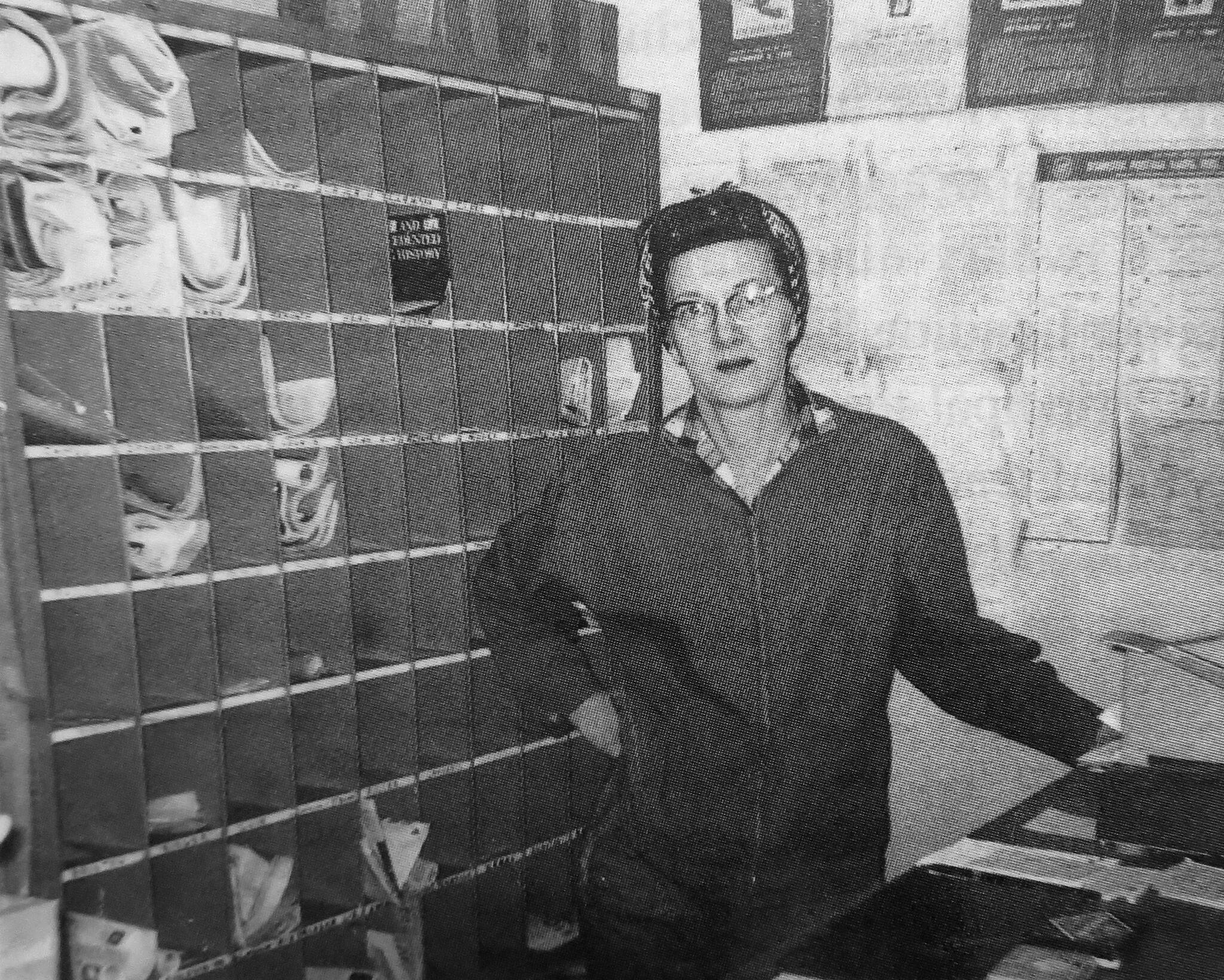 Betty Fuller, pictured here inside the Cooper Landing Post Office in 1964, began her 30-tenure as postmaster in 1963. (Photo courtesy of Mona Painter)