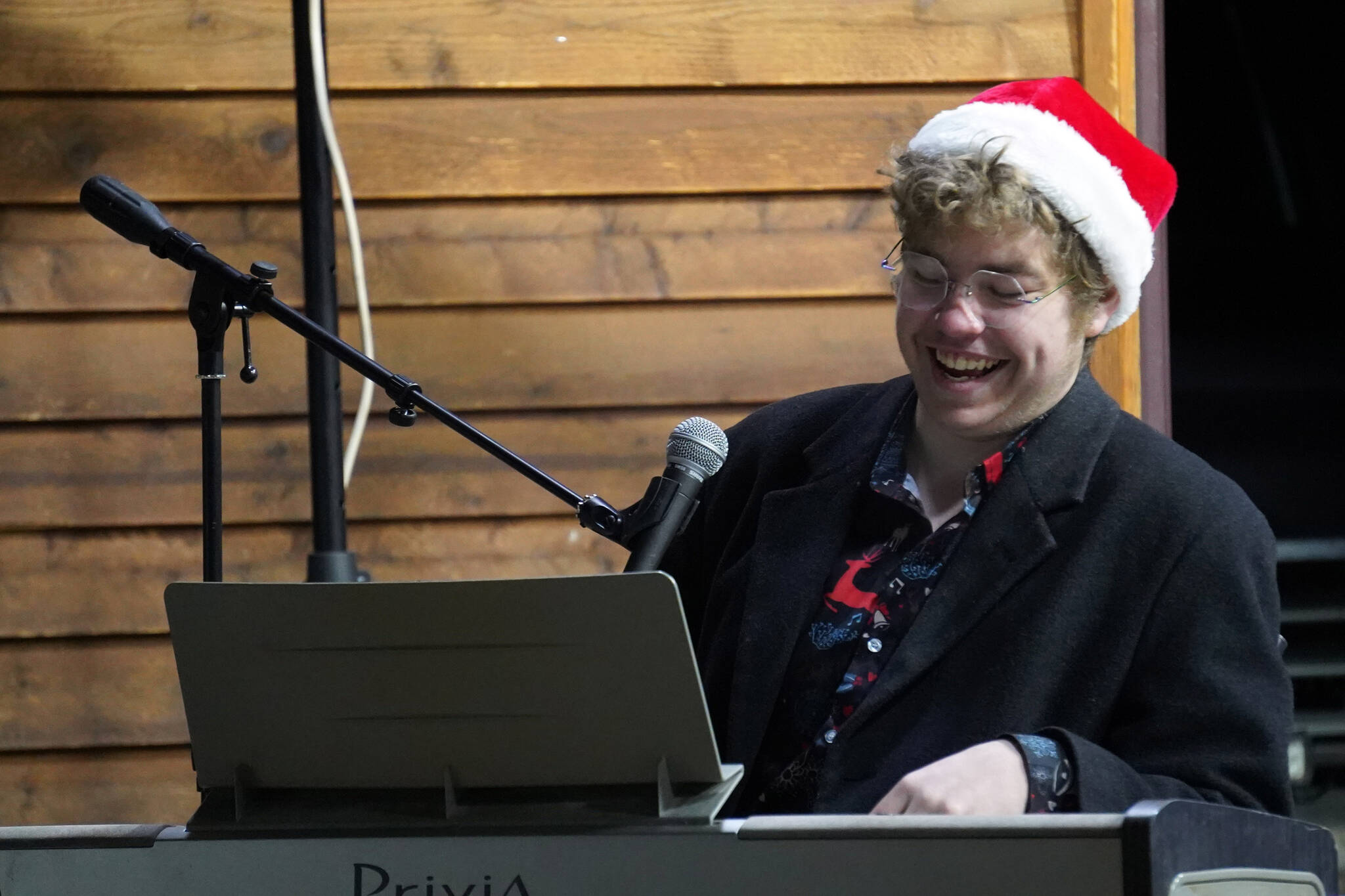 Josiah Burton performs during Christmas in the Park at Soldotna Creek Park in Soldotna, Alaska, on Saturday, Dec. 2, 2023. (Jake Dye/Peninsula Clarion)