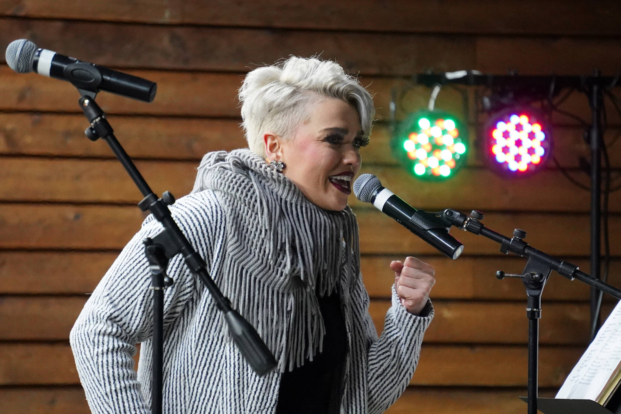 Ellie Nelson performs during Christmas in the Park at Soldotna Creek Park in Soldotna, Alaska, on Saturday, Dec. 2, 2023. (Jake Dye/Peninsula Clarion)