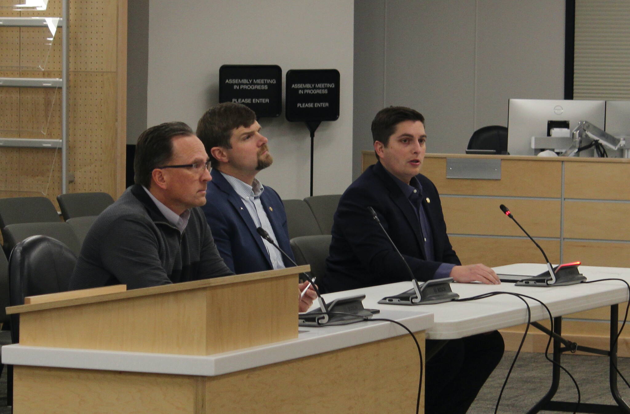 From left: Rep. Ben Carpenter, Sen. Jesse Bjorkman and Rep. Justin Ruffridge discuss their priorities regarding education during a work session with members of the Kenai Peninsula Borough School District on Monday, Dec. 4, 2023 in Soldotna, Alaska. (Ashlyn O’Hara/Peninsula Clarion)