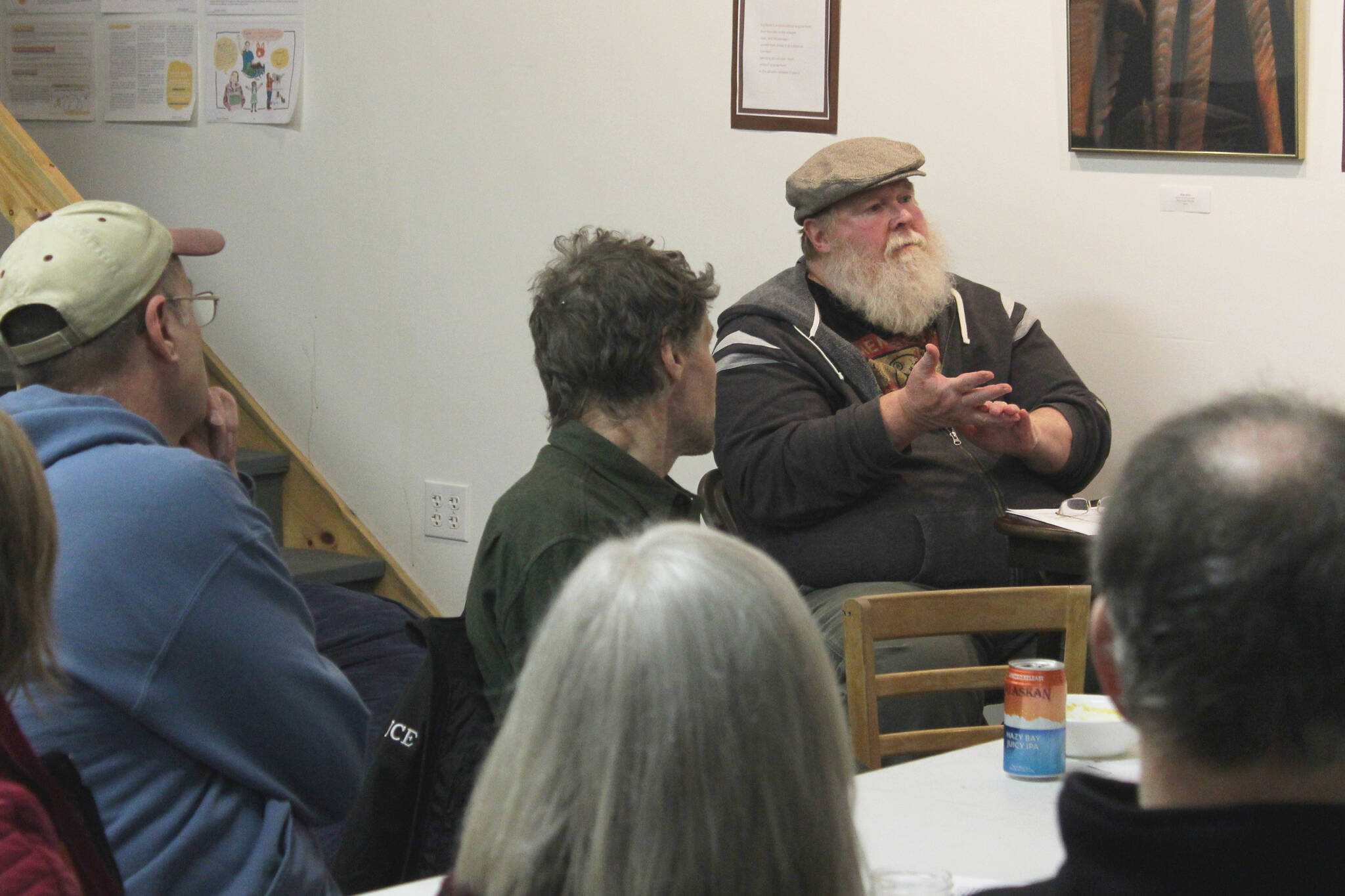 Larry Opperman (second from right) speaks during a community meeting about retrofitting homes to be more energy efficient at the Cook Inletkeeper Community Action Studio on Tuesday, Dec. 5, 2023, in Soldotna, Alaska. (Ashlyn O’Hara/Peninsula Clarion)