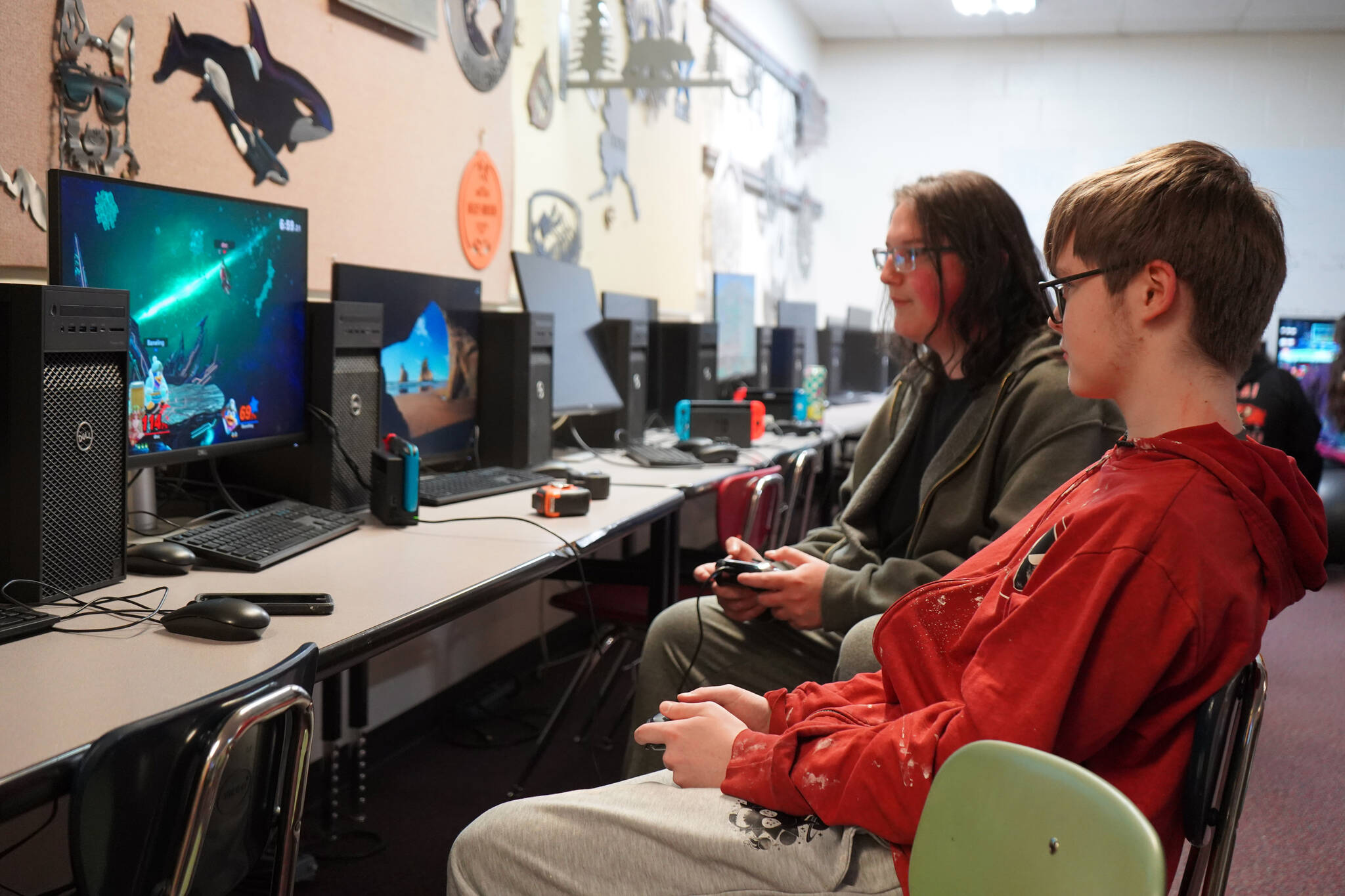 Kenai Central High School Esports players Landon Dubber and Blake Gillis play against one another in the Alaska Fall 2023 semifinals for Super Smash Bros. Ultimate at Kenai Central High School in Kenai, Alaska, on Thursday, Dec. 7, 2023. (Jake Dye/Peninsula Clarion)