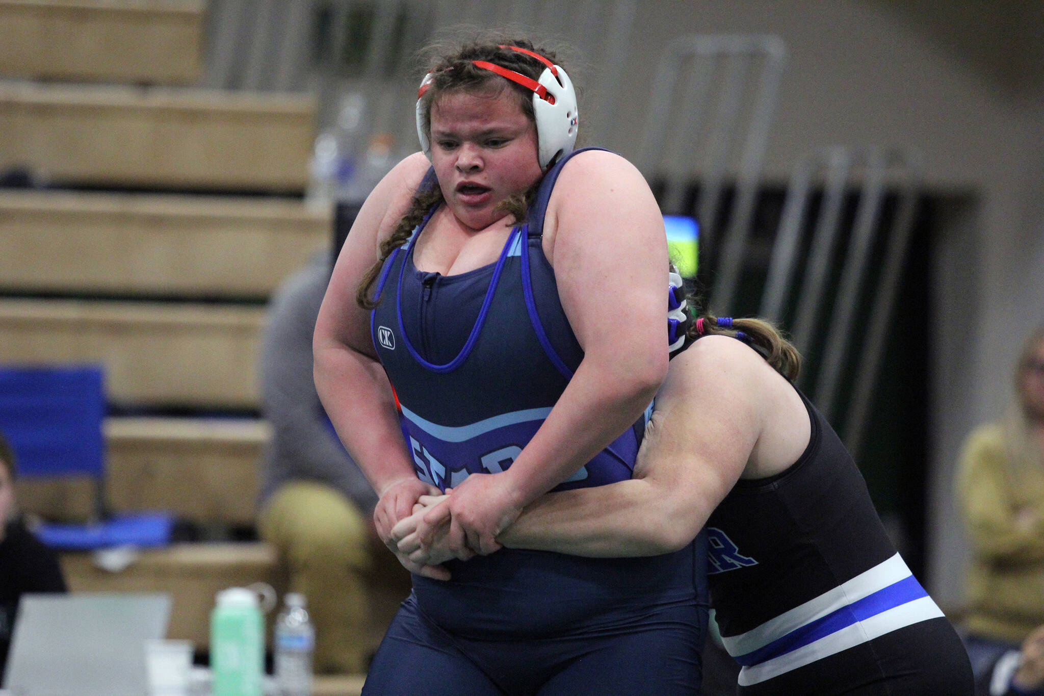 Soldotna’s Meg Roberts breaks away from Palmer’s Noelle Buck during the girls 235-pound final of the Northern Lights Conference Championships on Saturday, Dec. 9, 2023, at Colony High School in Palmer, Alaska. (Photo by Jeremiah Bartz/Frontiersman)