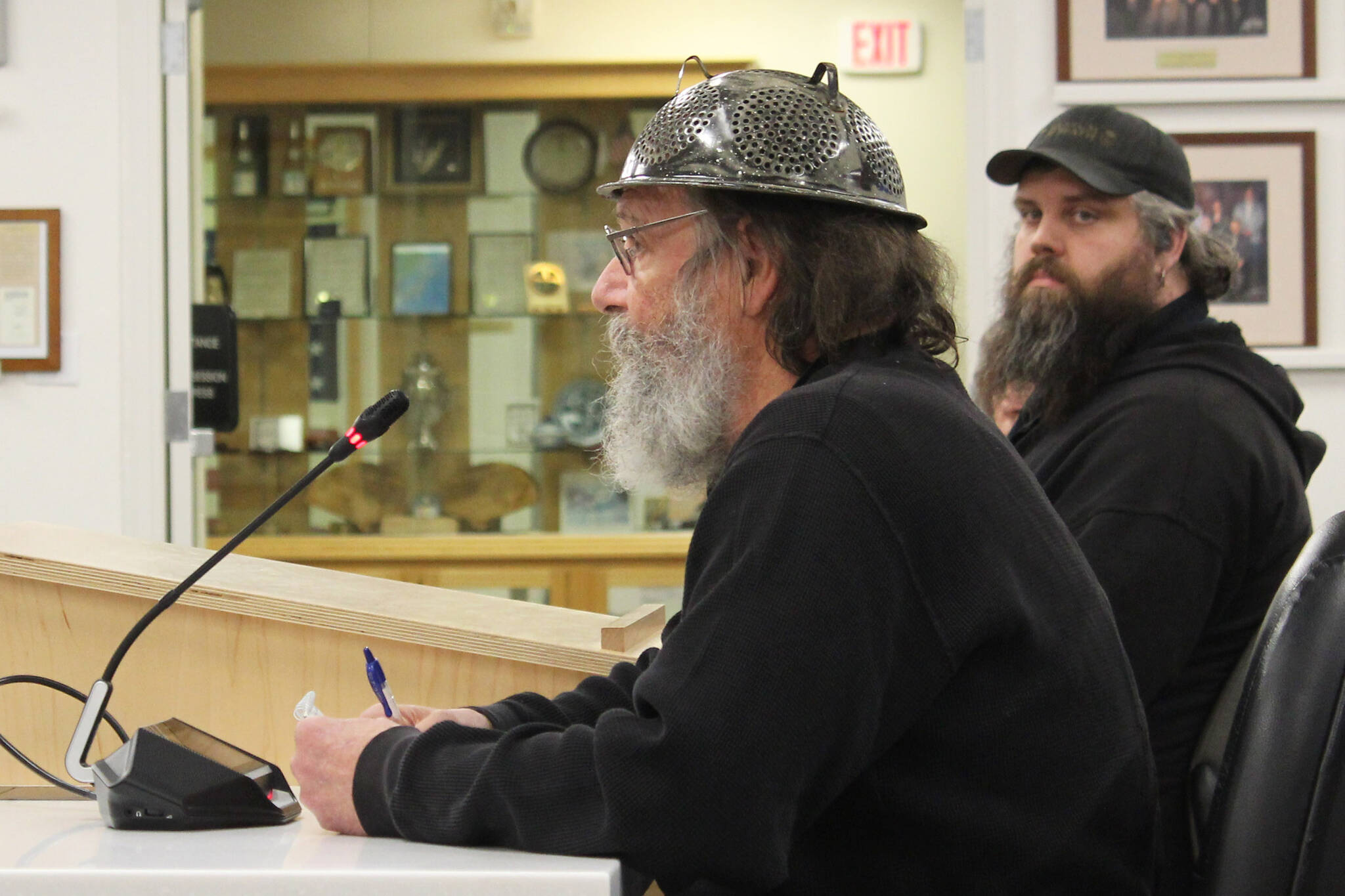 Pastafarian pastor Barrett Fletcher speaks in opposition to a new borough policy, which says only borough volunteer chaplains may deliver the invocation, a during a Kenai Peninsula Borough Assembly meeting on Tuesday, Dec. 12, 2023, in Soldotna, Alaska. (Ashlyn O’Hara/Peninsula Clarion)
