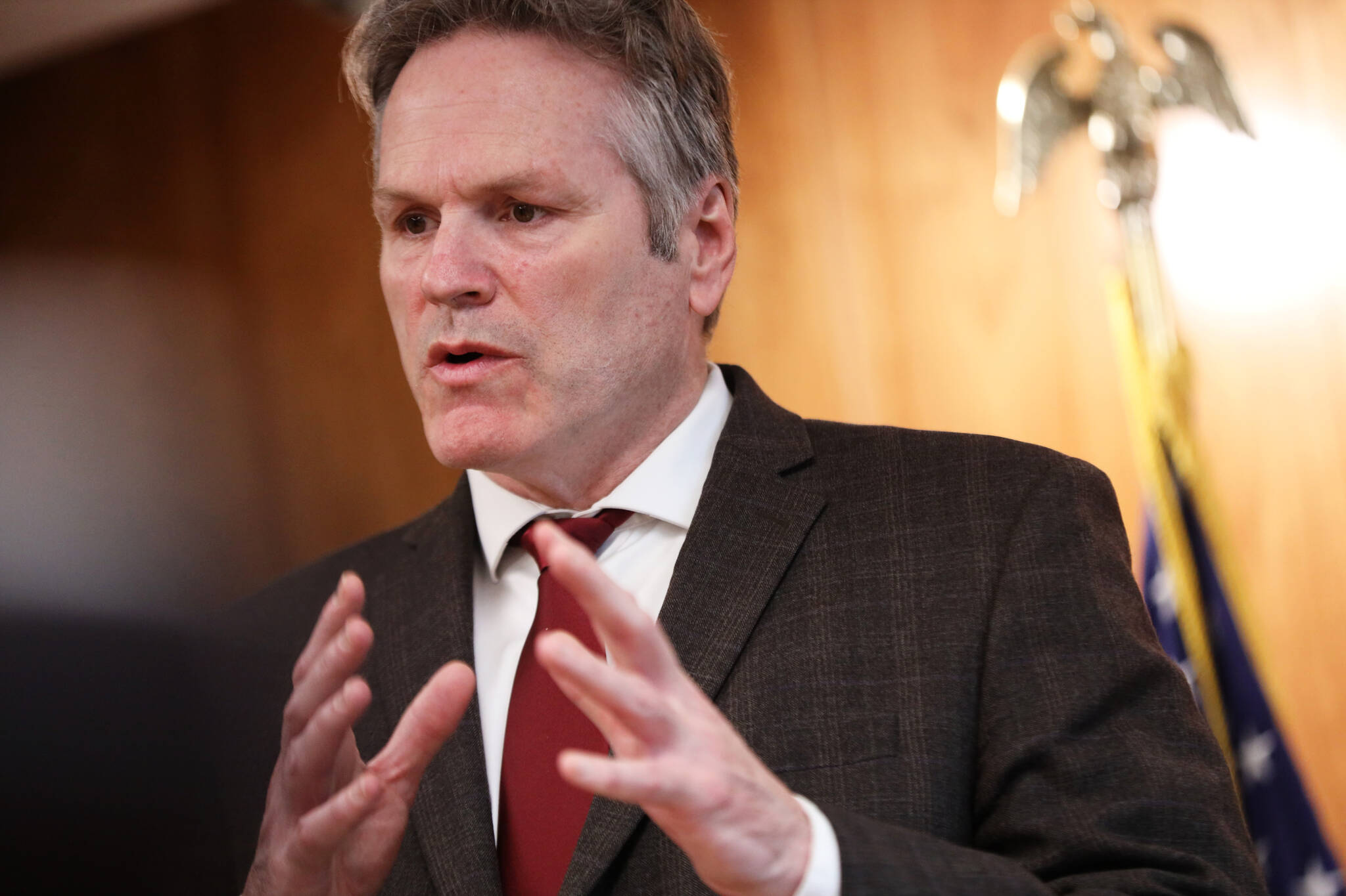 Gov. Mike Dunleavy speaks during a news conference. (Clarise Larson / Juneau Empire File)