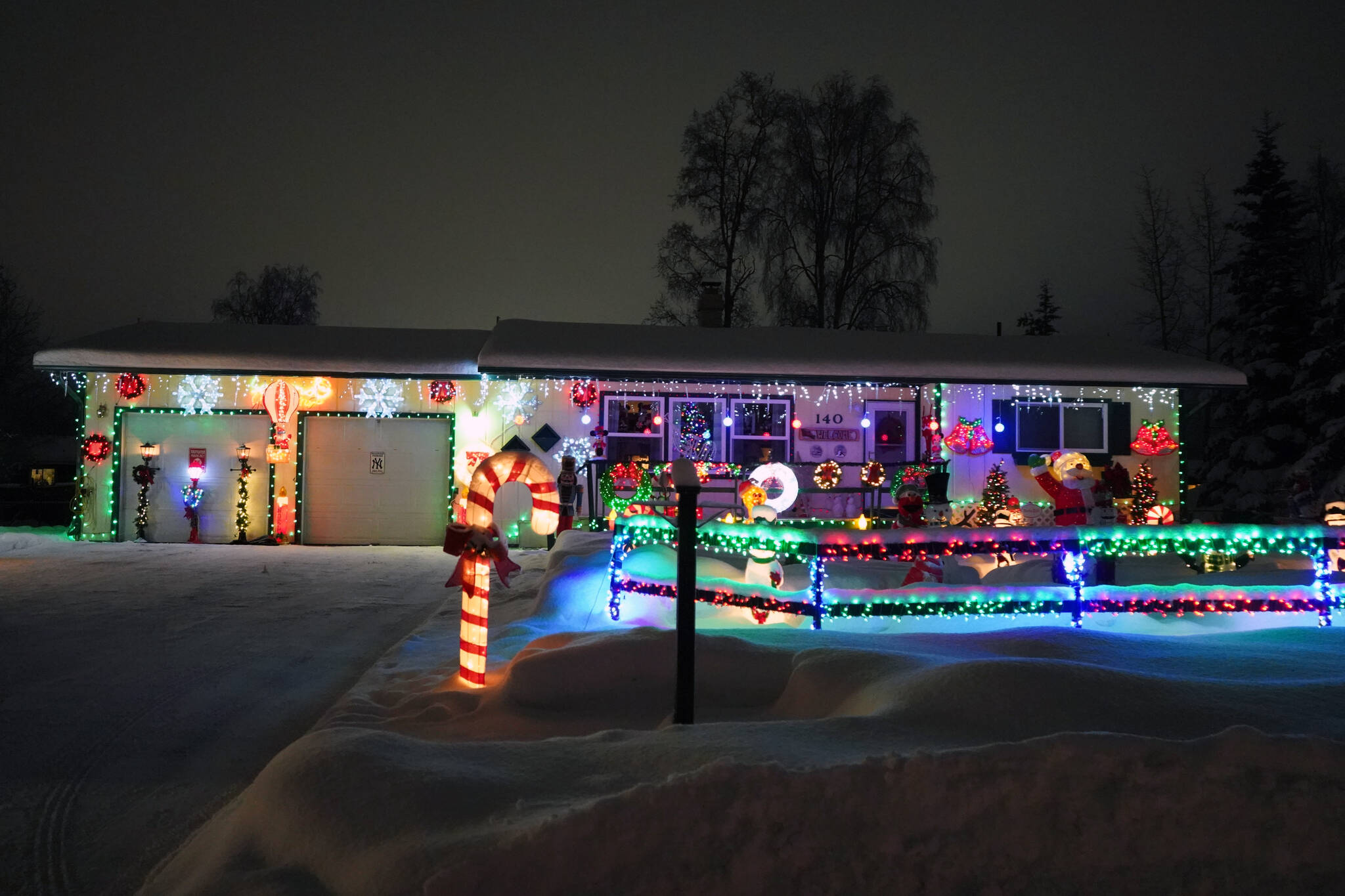 An array of Christmas lights brighten up the night outside the home of Gary Hale in Soldotna, Alaska, on Wednesday, Dec. 20, 2023. (Jake Dye/Peninsula Clarion)