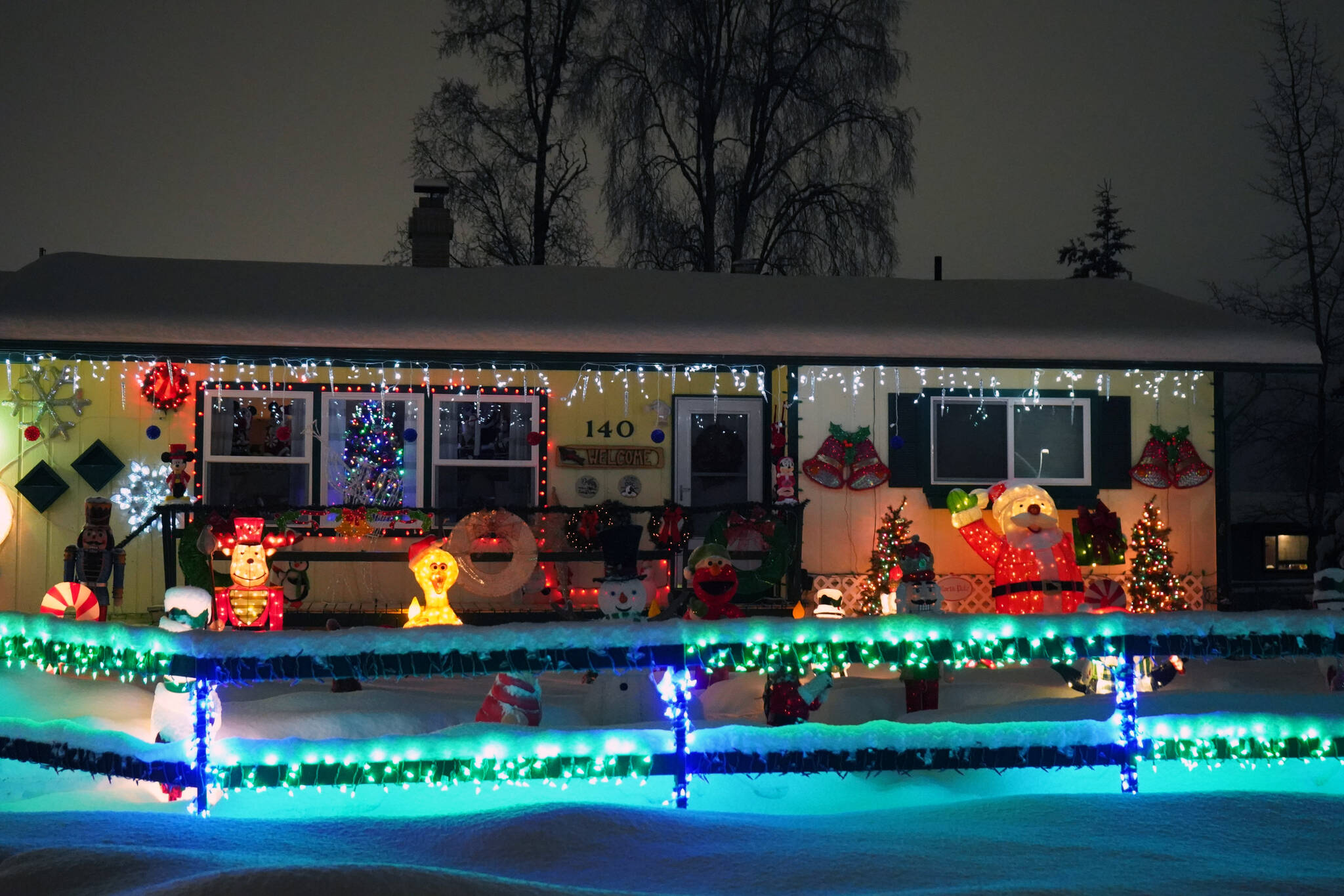 An array of Christmas lights brighten up the night outside the home of Gary Hale in Soldotna, Alaska, on Wednesday, Dec. 20, 2023. (Jake Dye/Peninsula Clarion)