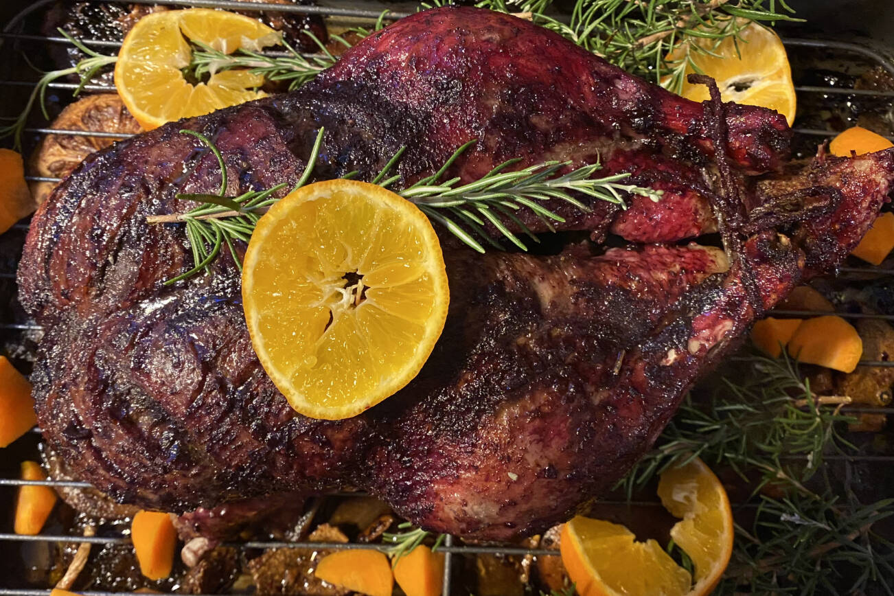 Roasted duck is served with rosemary and oranges. (Photo by Tressa Dale/Peninsula Clarion)