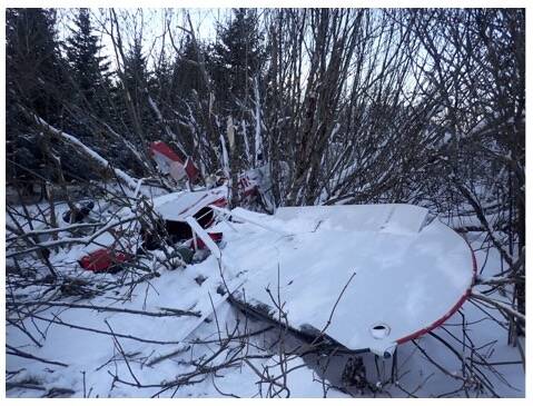 Airplane wreckage sits in brush on Saturday, Dec. 9, 2023, near Anchor Point, Alaska. (Photo via National Transportation Safety Board)