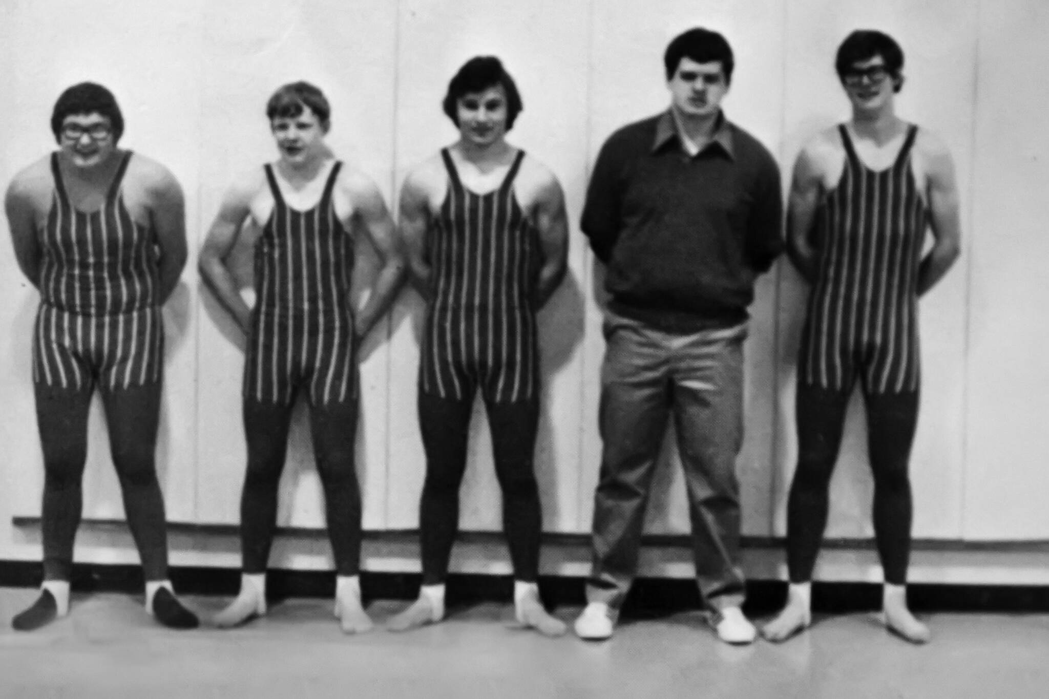 Besides his P.E. duties, Rex Edwards also coached swimming and wrestling and was involved in numerous other activities. Here, he poses with his wrestlers. (Image courtesy of Rex and Beverly Edwards)