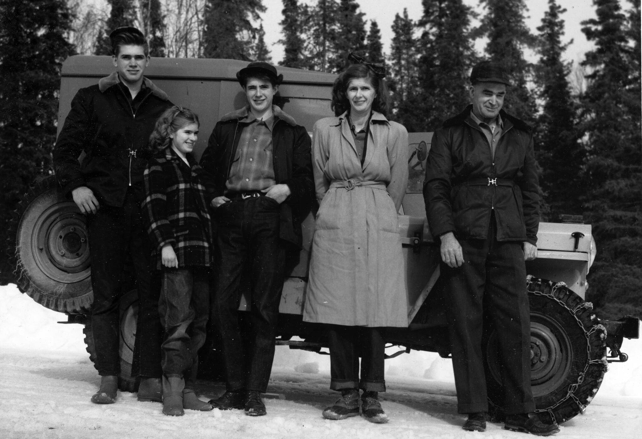 Photo courtesy of the Keeler Family Collection
In 1951, shortly after they had purchased their new jeep (pictured), the Keeler family (L-R: Larry, April, Marion, Lorna and Lawrence) used it to help another traveler extract his own vehicle from a snowy ditch. The other driver took this photo and later sent a copy of the image to the Keelers.
