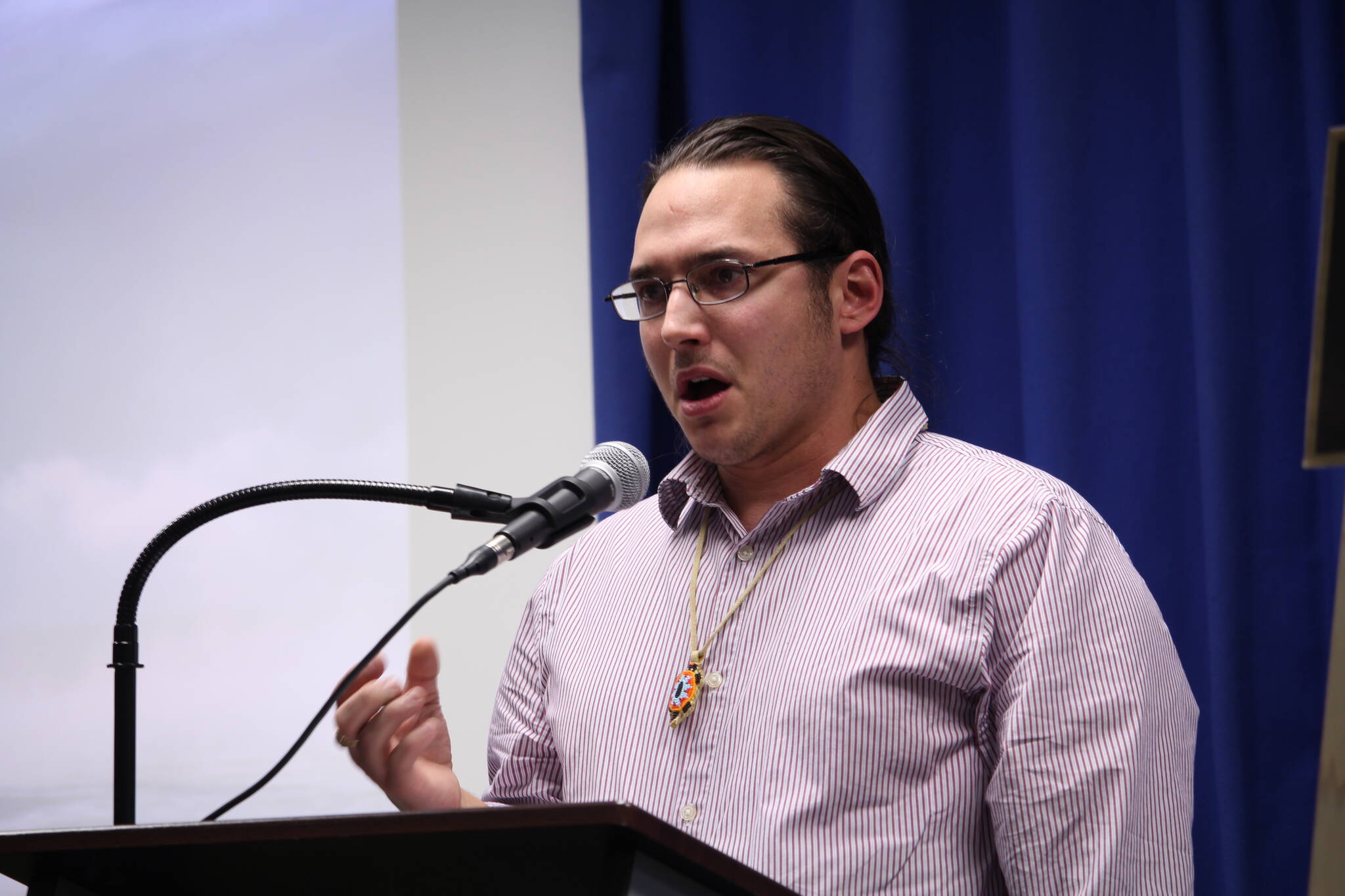 Joel Isaak, Kenaitze Tribe Member and adjunct professor at Kenai Peninsula College, speaks during a Celebration of Life for Dr. Alan Boraas at Kenai Peninsula College on Jan. 17, 2020. (Photo by Brian Mazurek/Peninsula Clarion)