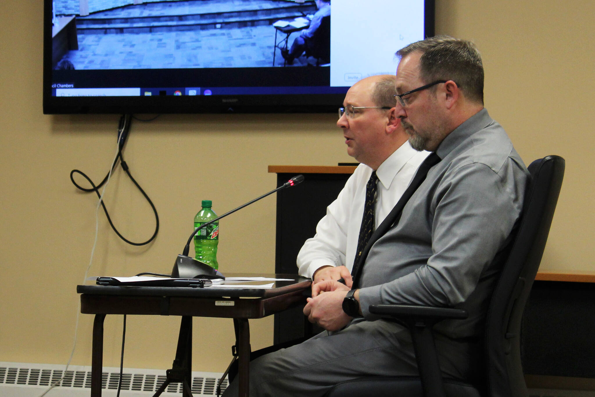 Kenai Finance Director David Swarner (left) and City Manager Terry Eubank (right) present city budget goals for Fiscal Year 2025 during a work session with Kenai City Council members on Wednesday, Jan. 3, 2024 in Kenai, Alaska. (Ashlyn O’Hara/Peninsula Clarion)