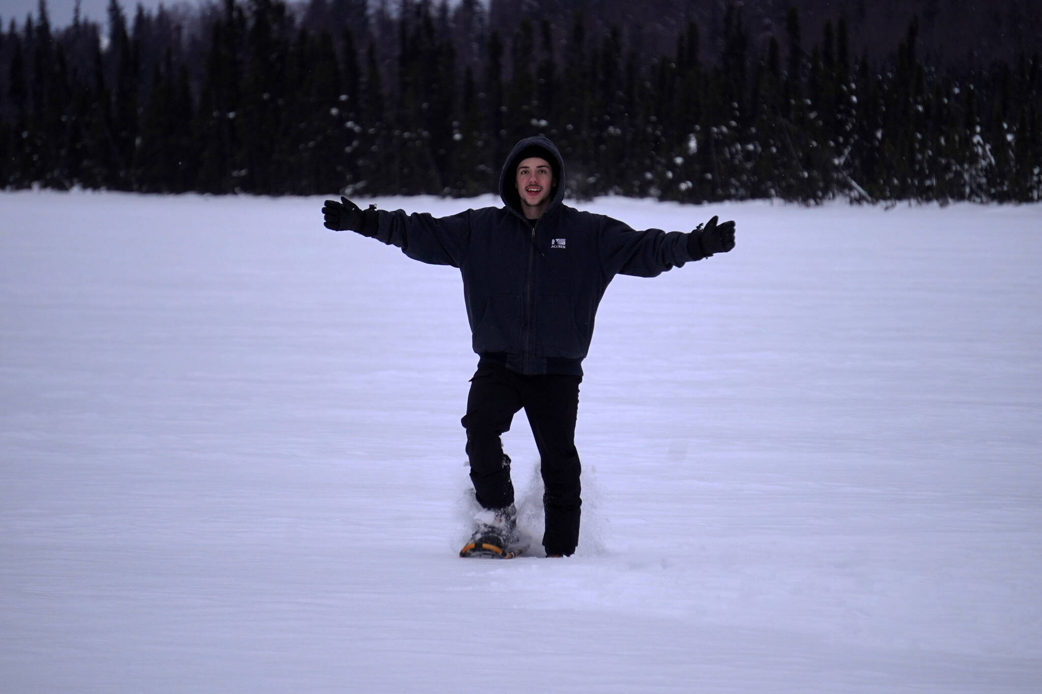 Nuno Venturi uses snowshoes to cross Headquarters Lake in the Kenai National Wildlife Refuge near Soldotna, Alaska, on Saturday, Jan. 6, 2024. (Jake Dye/Peninsula Clarion)