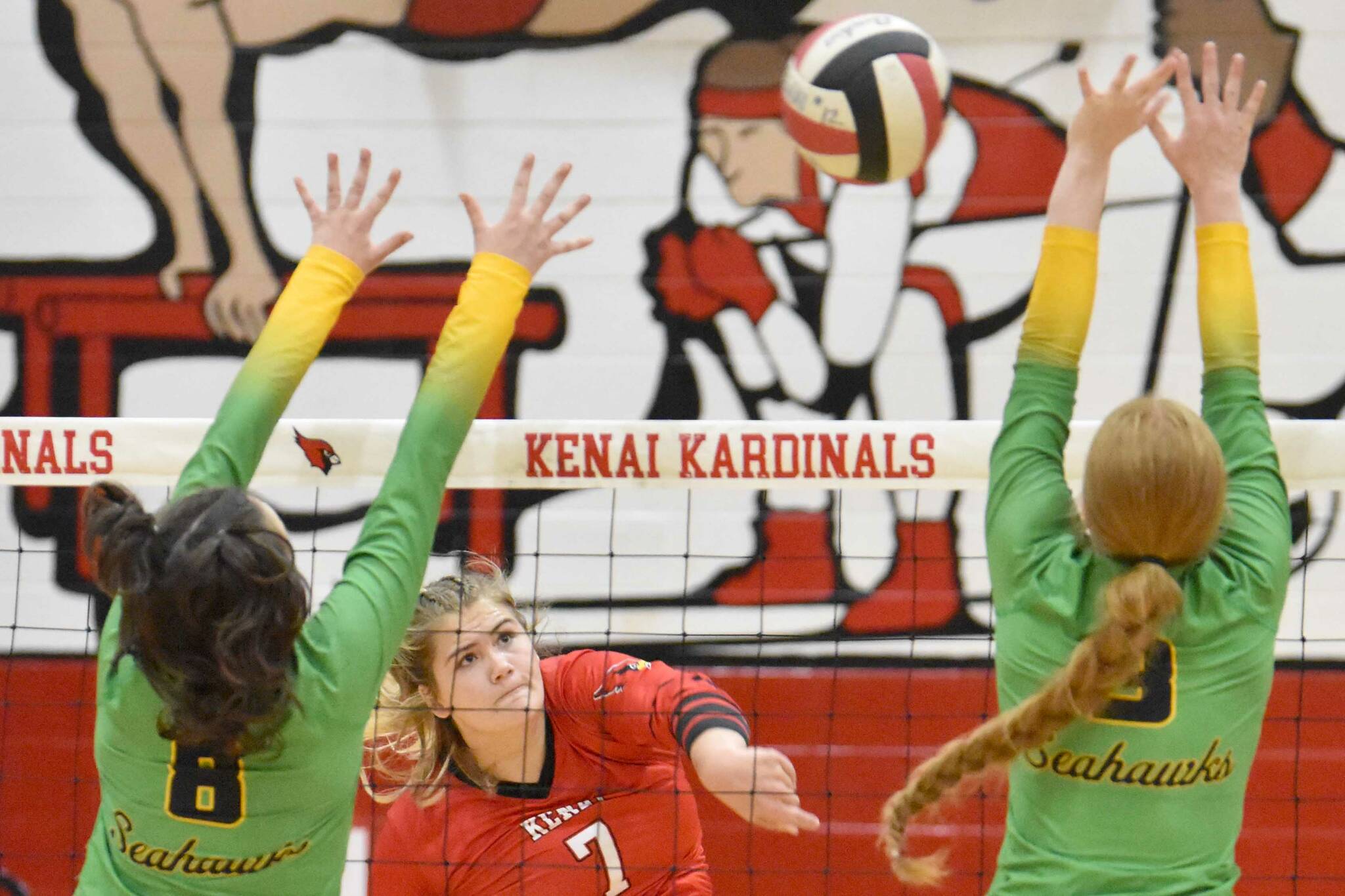 Kenai Central's Emma Beck attacks against Seward's Mikinley Williams and Robin Cronin on Tuesday, Sept. 5, 2023, at Kenai Central High School in Kenai, Alaska. (Photo by Jeff Helminiak/Peninsula Clarion)