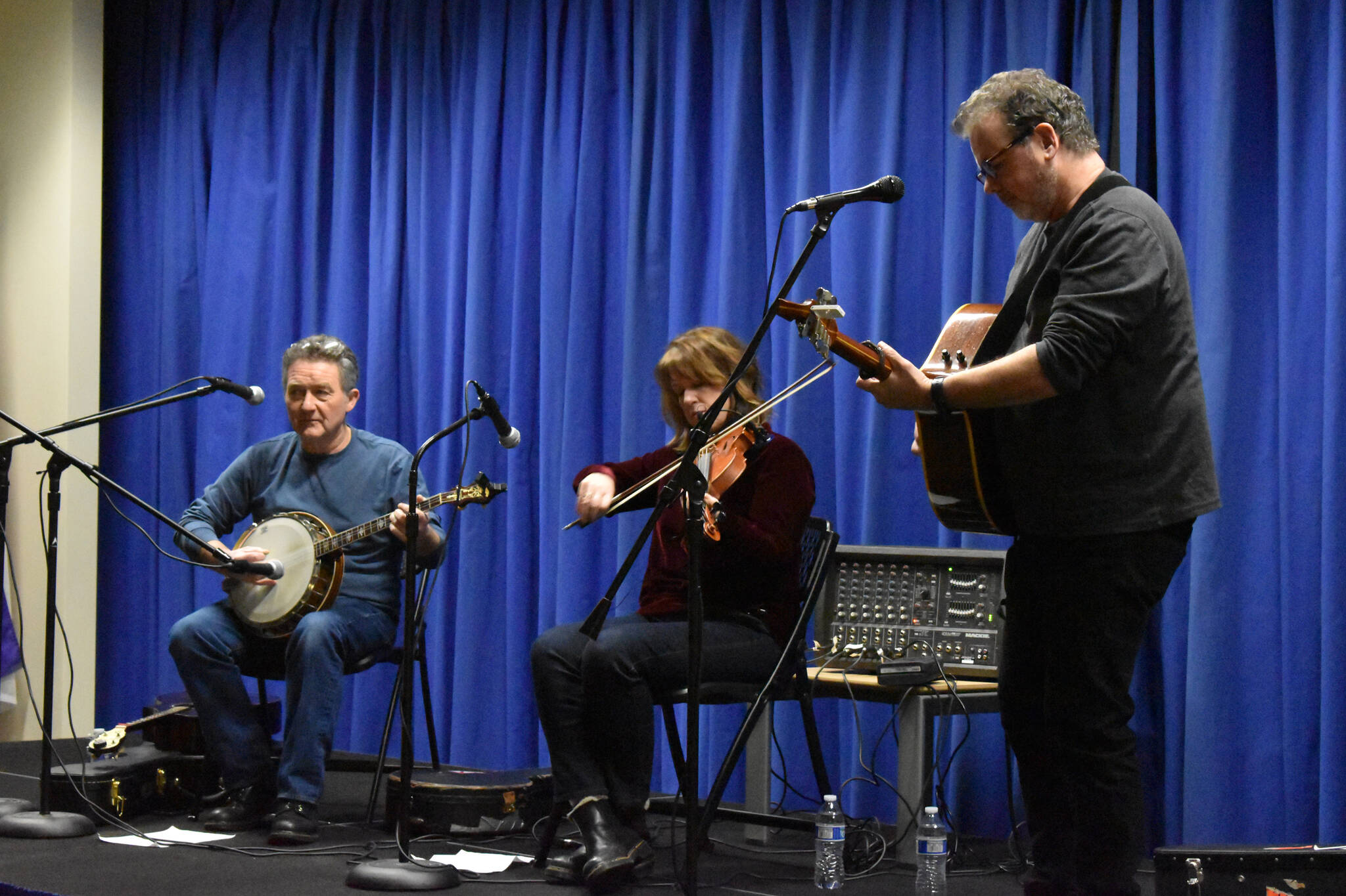 John Walsh, Rose Flanagan and Pat Broaders perform during "An Evening of Traditional Irish Music" on Friday, Jan. 27, 2023, at Kenai Peninsula College in Soldotna, Alaska. (Jake Dye/Peninsula Clarion)