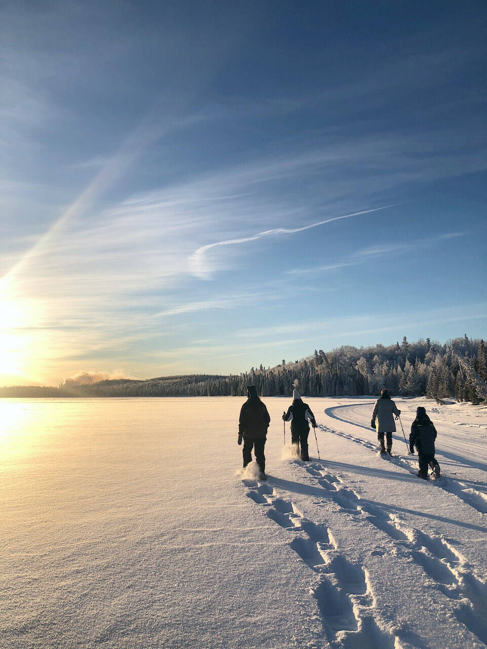 Snowshoers make fresh tracks on Headquarters Lake on a weekly guided walk at Kenai National Wildlife Refuge. (Photo by Leah Eskelin/USFWS)