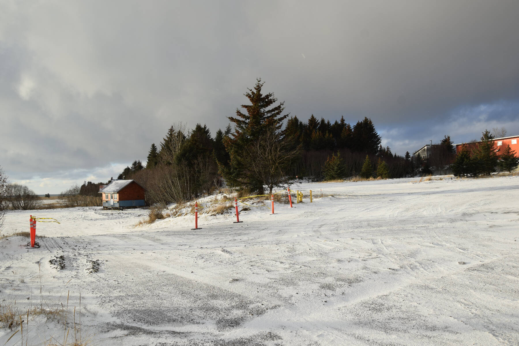 The former Lighthouse Village property, now owned by Doyon Inc. and the proposed site for the construction of a large hotel complex, is photographed on Friday, Dec. 8, 2023, in Homer, Alaska. (Delcenia Cosman/Homer News)