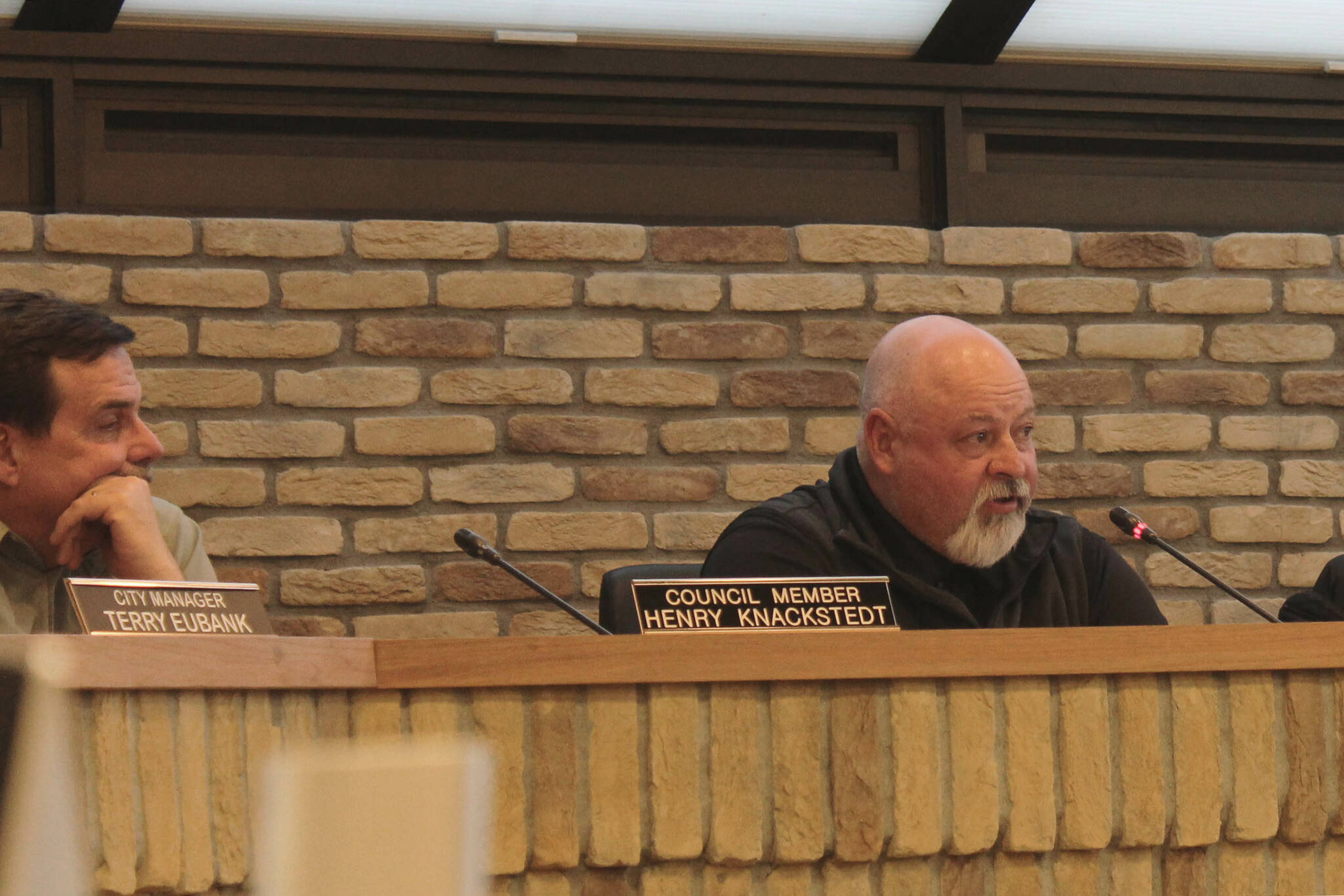 Kenai Vice Mayor James Baisden, right, speaks in opposition to a resolution that would have voiced the City of Kenai’s support for a legislative increase in school district funding during a city council meeting on Wednesday, April 5, 2023, in Kenai, Alaska. (Ashlyn O’Hara/Peninsula Clarion)