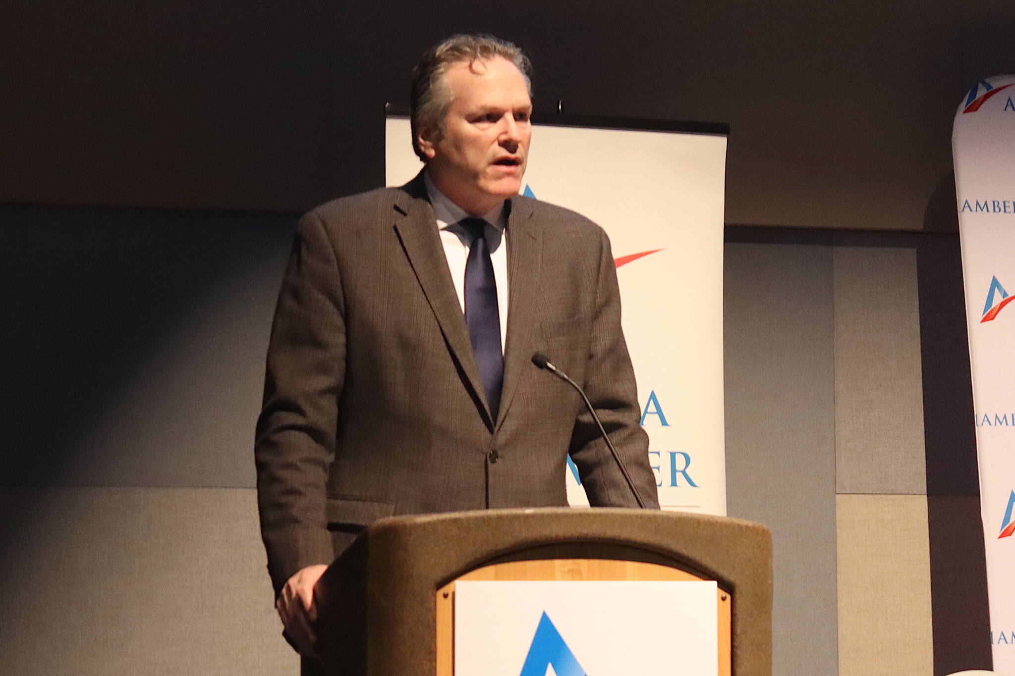 Gov. Mike Dunleavy speaks to a joint meeting of the Juneau and Alaska chambers of commerce Thursday at Centennial Hall. (Mark Sabbatini / Juneau Empire)