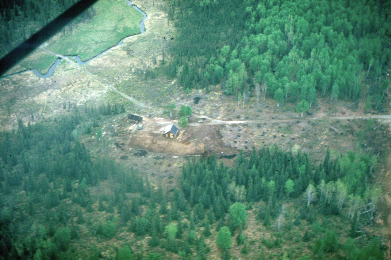 Virgil Dahler photo courtesy of the KPC historical photo archive
This aerial view from about 1950 shows Jack Keeler’s home on his homestead east of Soldotna. The stream to the left is Soldotna Creek, and the bridge across the stream probably allowed early access to the Mackey Lakes area. The road to the right edge of the photo leads to the Sterling Highway.