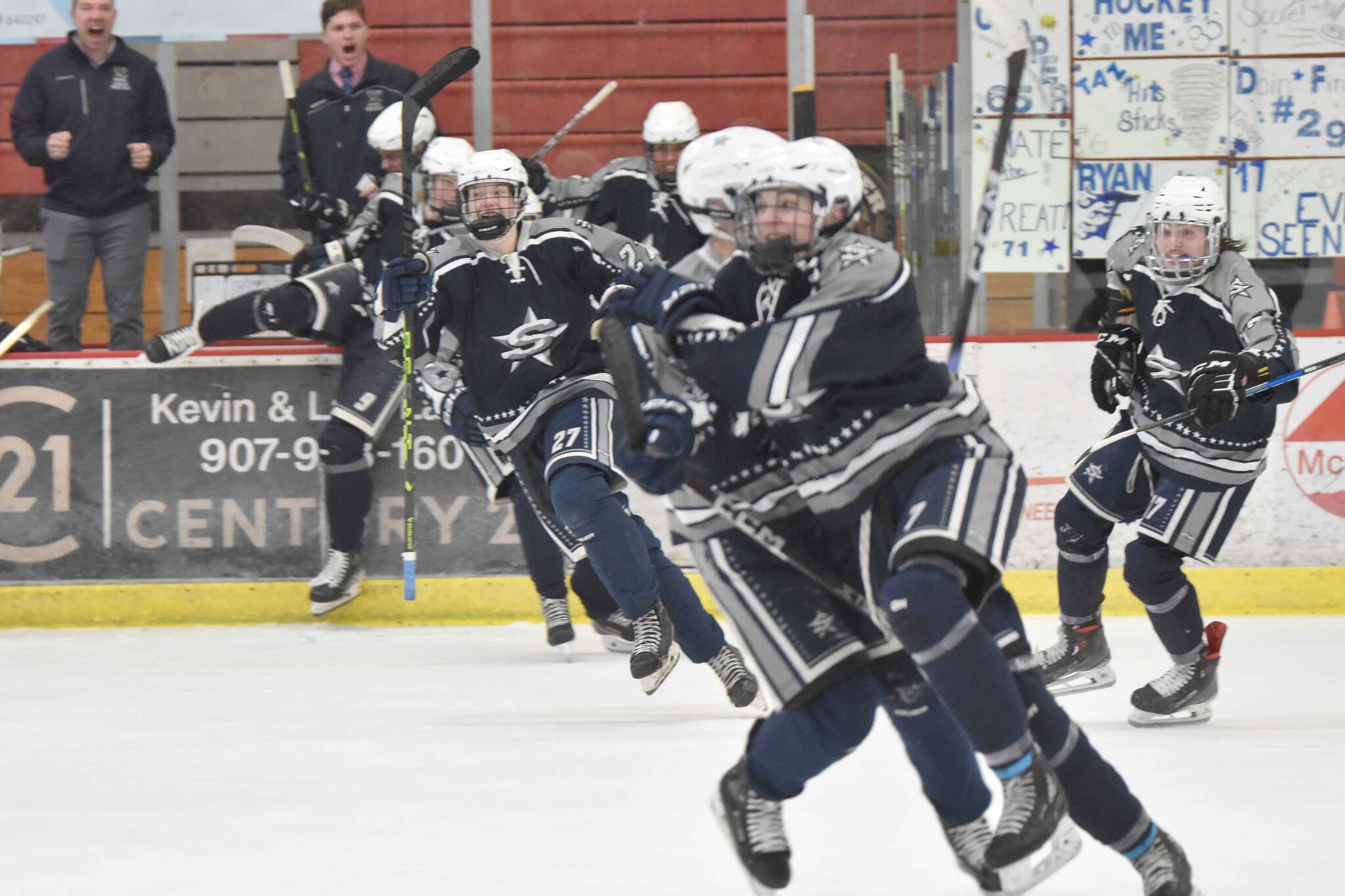 Soldotna's Jace Appelhans (front of pack) celebrates his game-winning goal over Palmer in overtime at the Division II state tournament Friday, Feb. 2, 2024, at the Soldotna Regional Sports Complex in Soldotna, Alaska. (Photo by Jeff Helminiak/Peninsula Clarion)