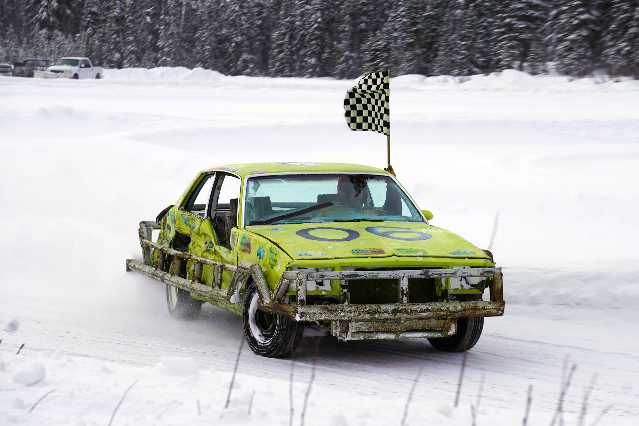 Ralph Mills celebrates winning the Men’s Main Event race as part of Kenai Peninsula Ice Racing at the Decanter Inn in Kasilof, Alaska, on Sunday, Feb. 4, 2024. (Jake Dye/Peninsula Clarion)
