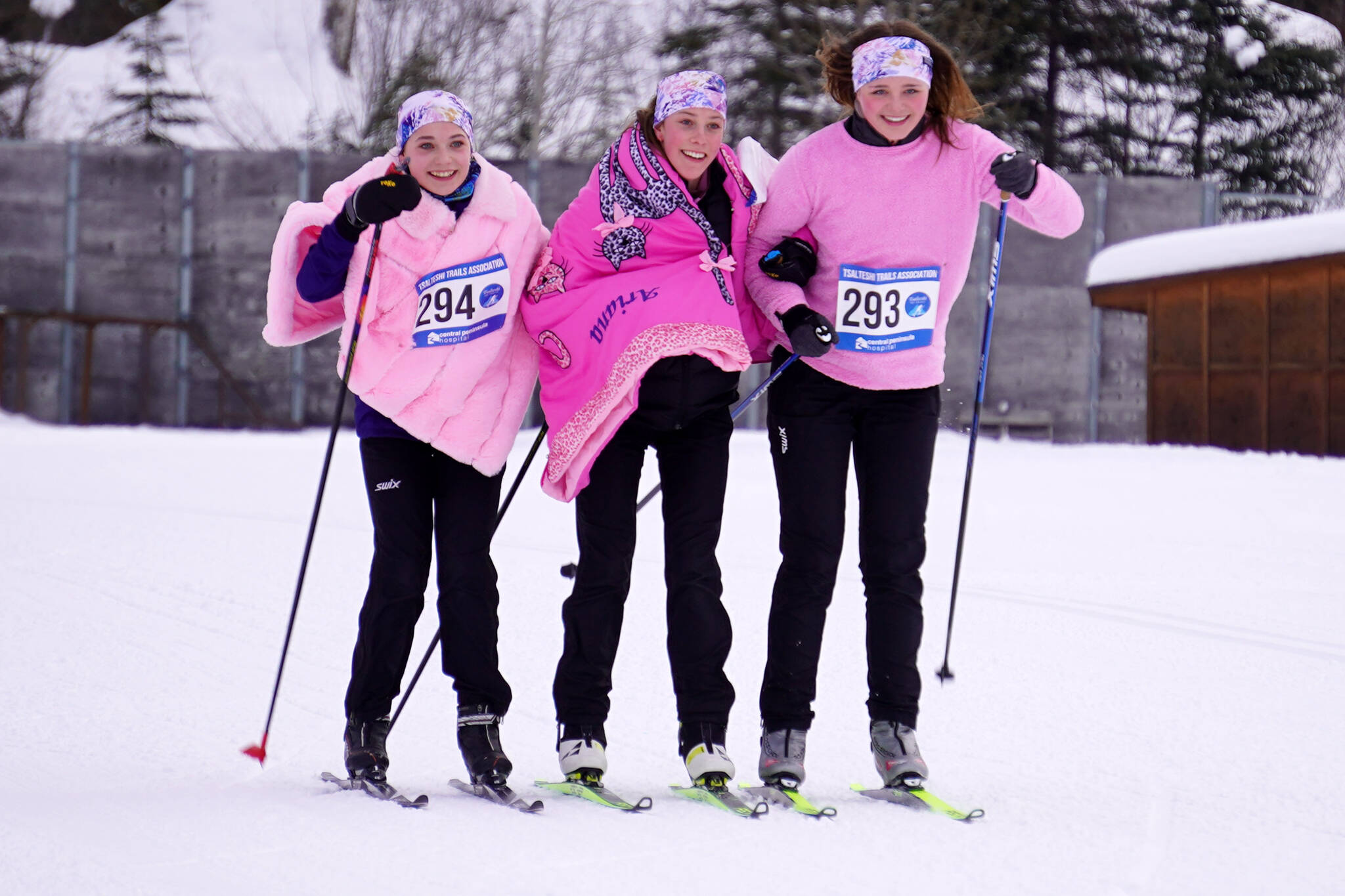 Kate Cox, Tania Boonstra and Ariana Cannava ski together to tie for third in the 5-kilometer skate race during the 20th Annual Ski for Women at Tsalteshi Trails near Soldotna, Alaska, on Sunday, Feb. 11, 2024. (Jake Dye/Peninsula Clarion)