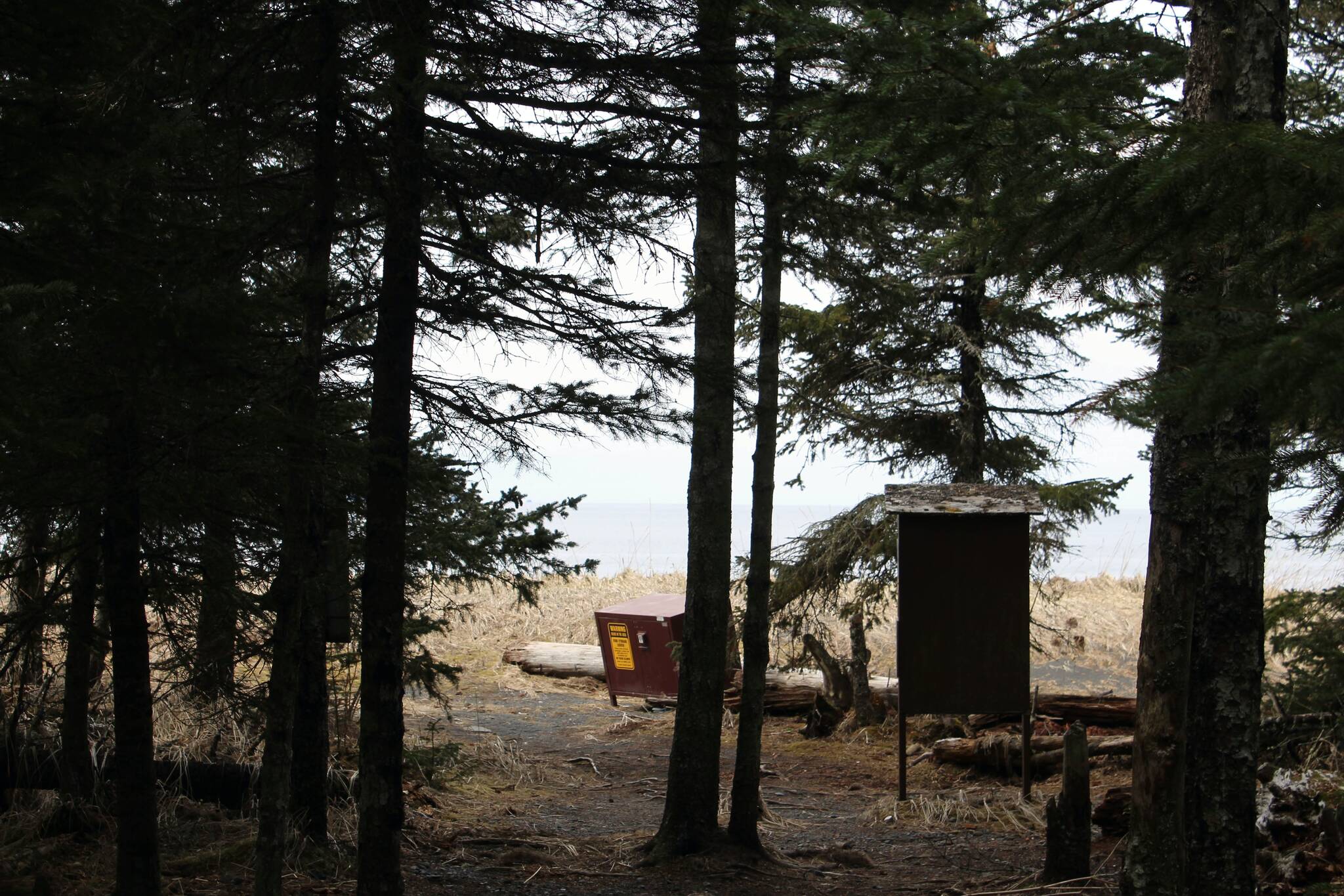 Signage marks a trailhead in Kachemak Bay State Park on Saturday, May 6, 2023, near Homer, Alaska. (Ashlyn O’Hara/Peninsula Clarion)