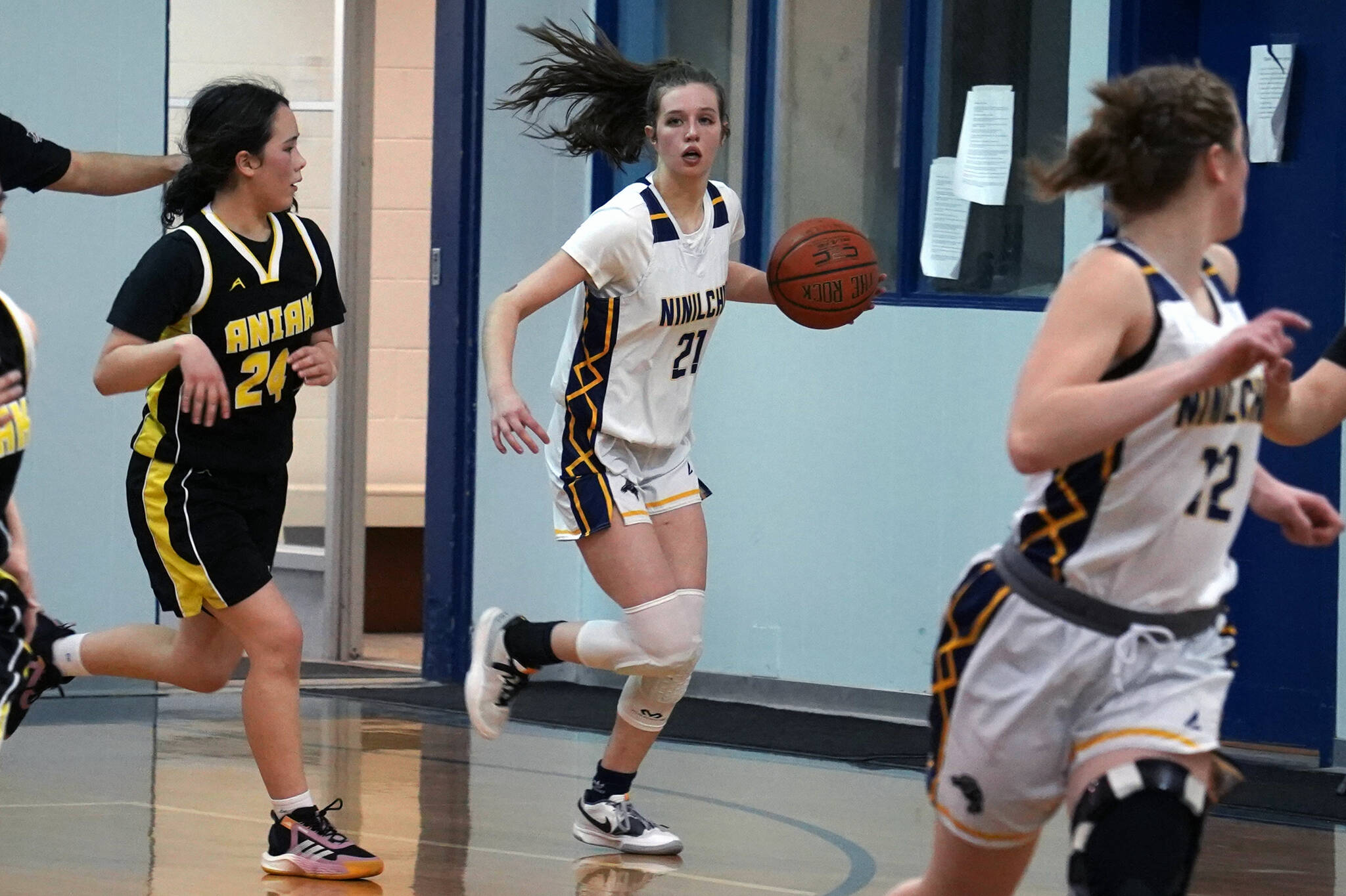 Ninilchik’s Riley Tucker moves down the court during a basketball game at Ninilchik School in Ninilchik, Alaska, on Wednesday, Feb. 14, 2024. (Jake Dye/Peninsula Clarion)