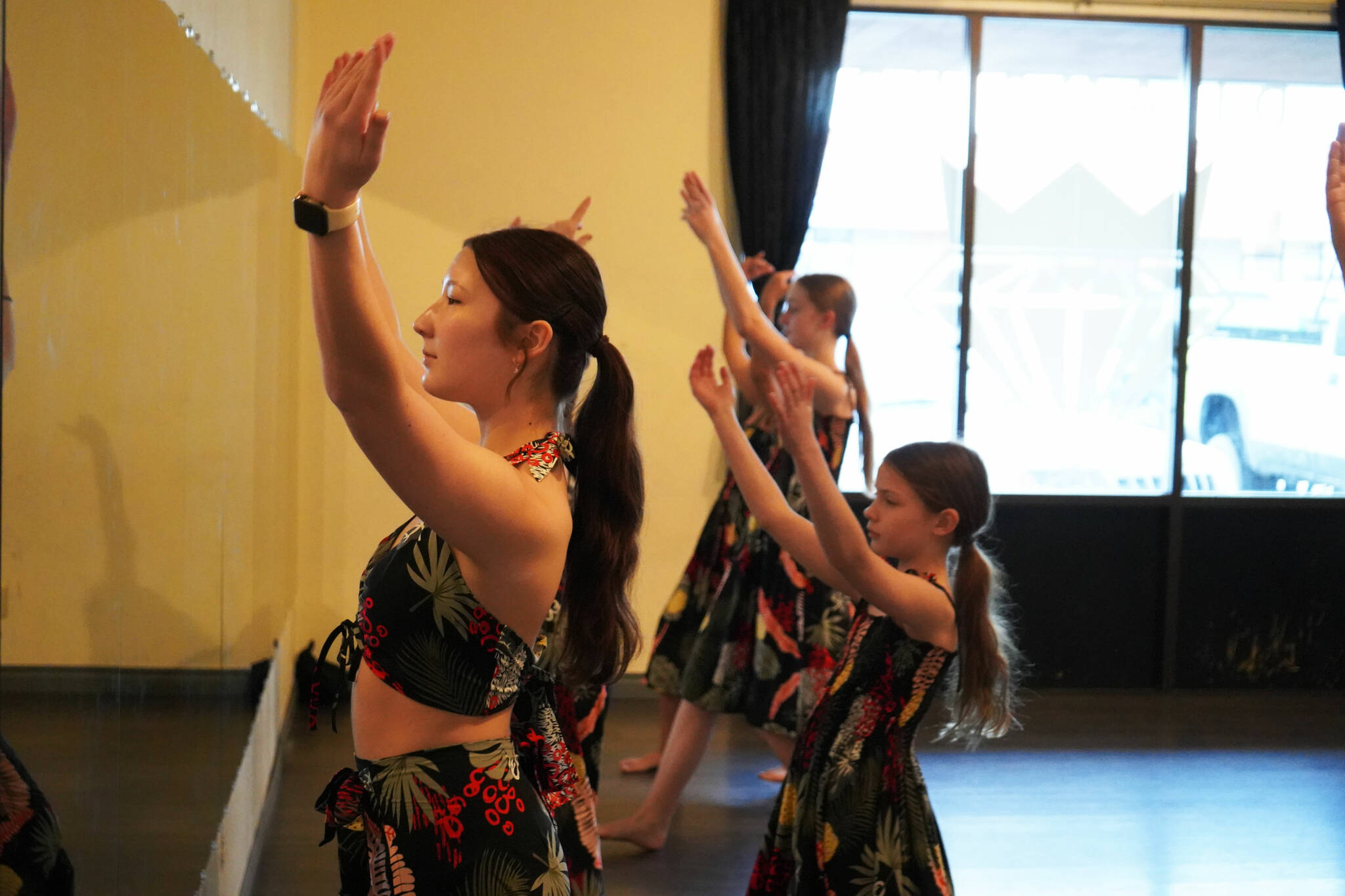 Dancers rehearse a hula routine at Diamond Dance Project near Soldotna, Alaska, on Thursday, Feb. 15, 2024. (Jake Dye/Peninsula Clarion)