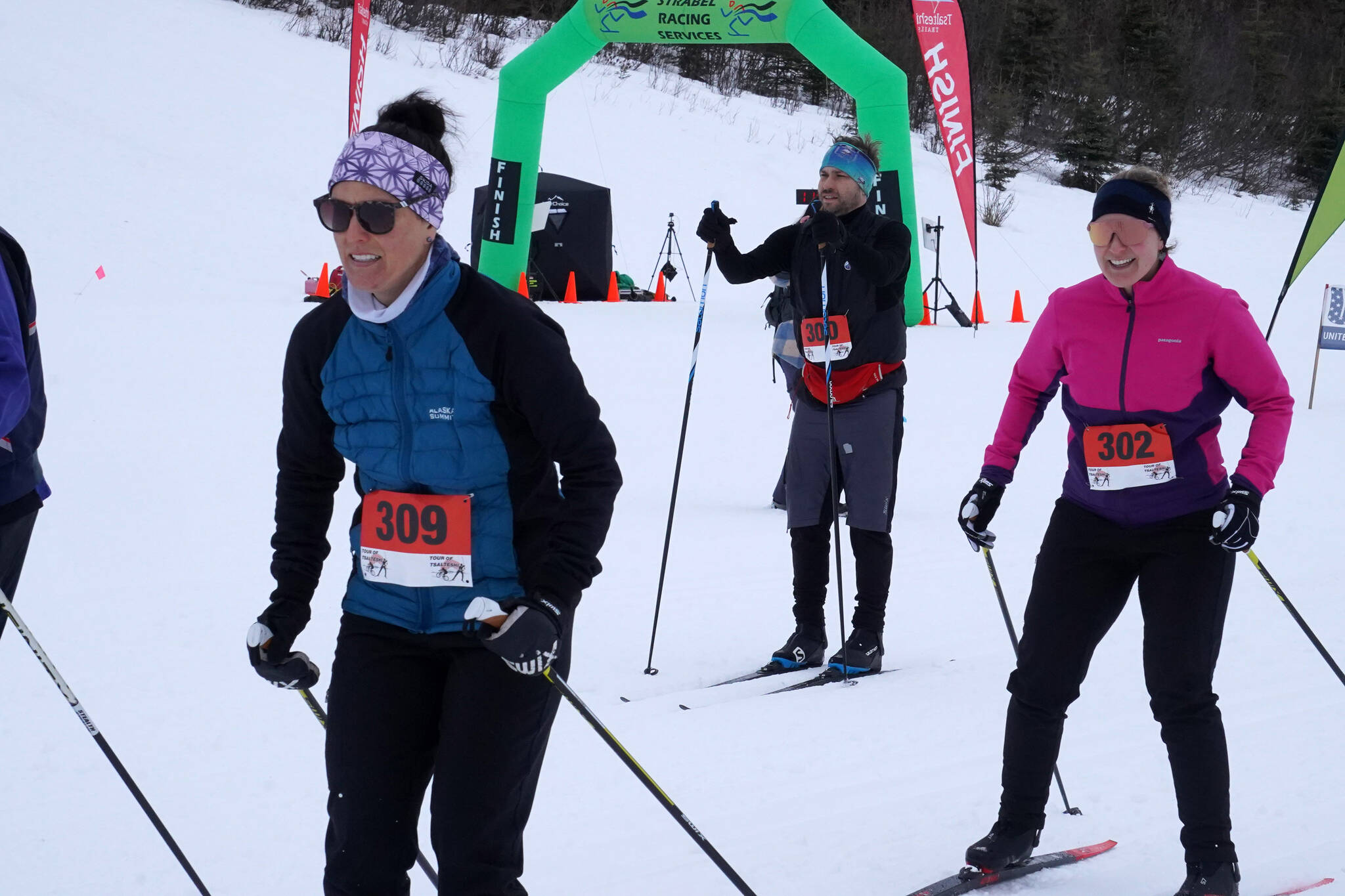 Michelle Quinton, Travis Brown and Theresa Chihuly set out for the 10-kilometer Half Tour during the Tour of Tsalteshi at Tsalteshi Trails near Soldotna, Alaska, on Sunday, Feb. 18, 2024. (Jake Dye/Peninsula Clarion)