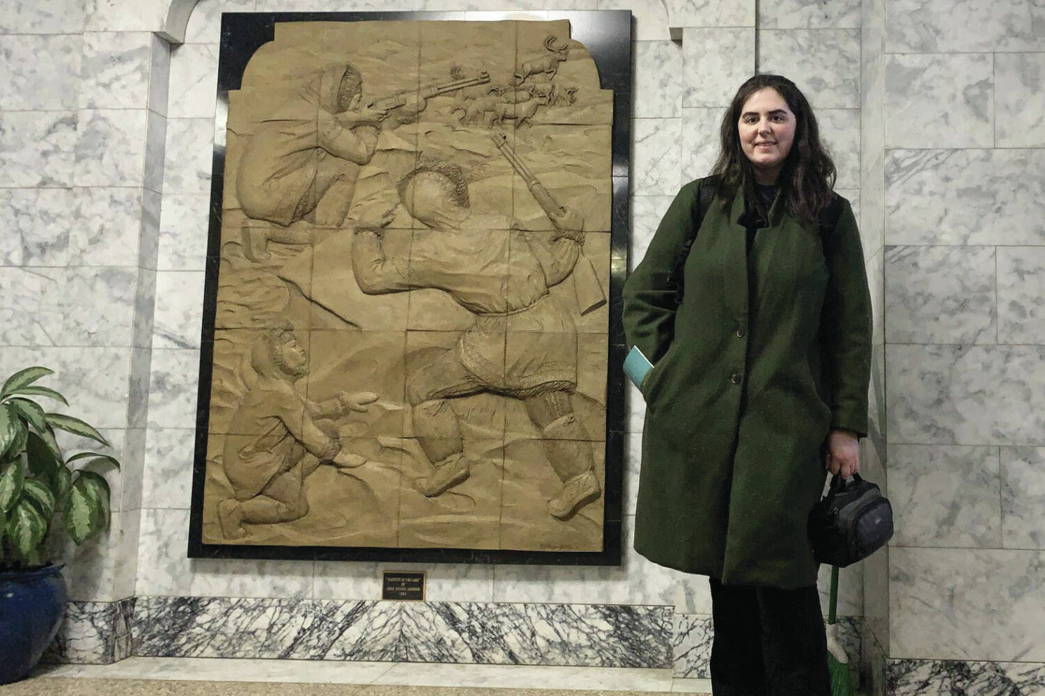 Peninsula Clarion government and education reporter Ashlyn O’Hara stands in the hallways of the Alaska State Capitol in Juneau on Monday. (Ashlyn O’Hara/Peninsula Clarion)